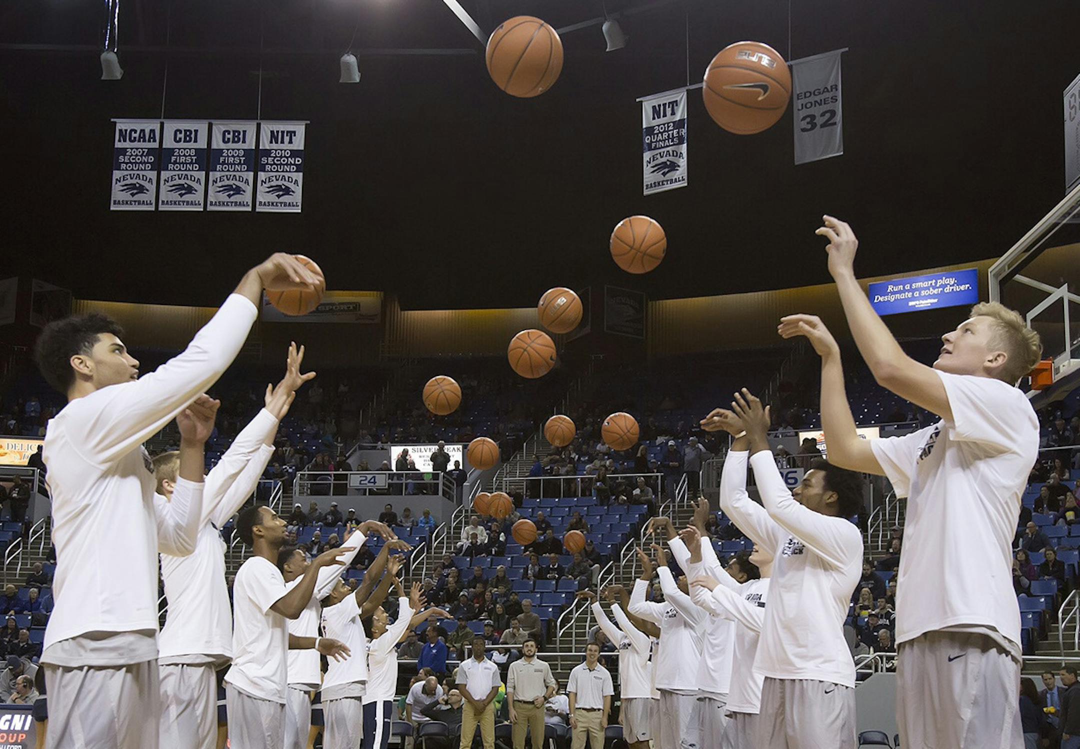 The University of Nevada men's basketball team warms up just as the Gophers did in the mid-1970s.