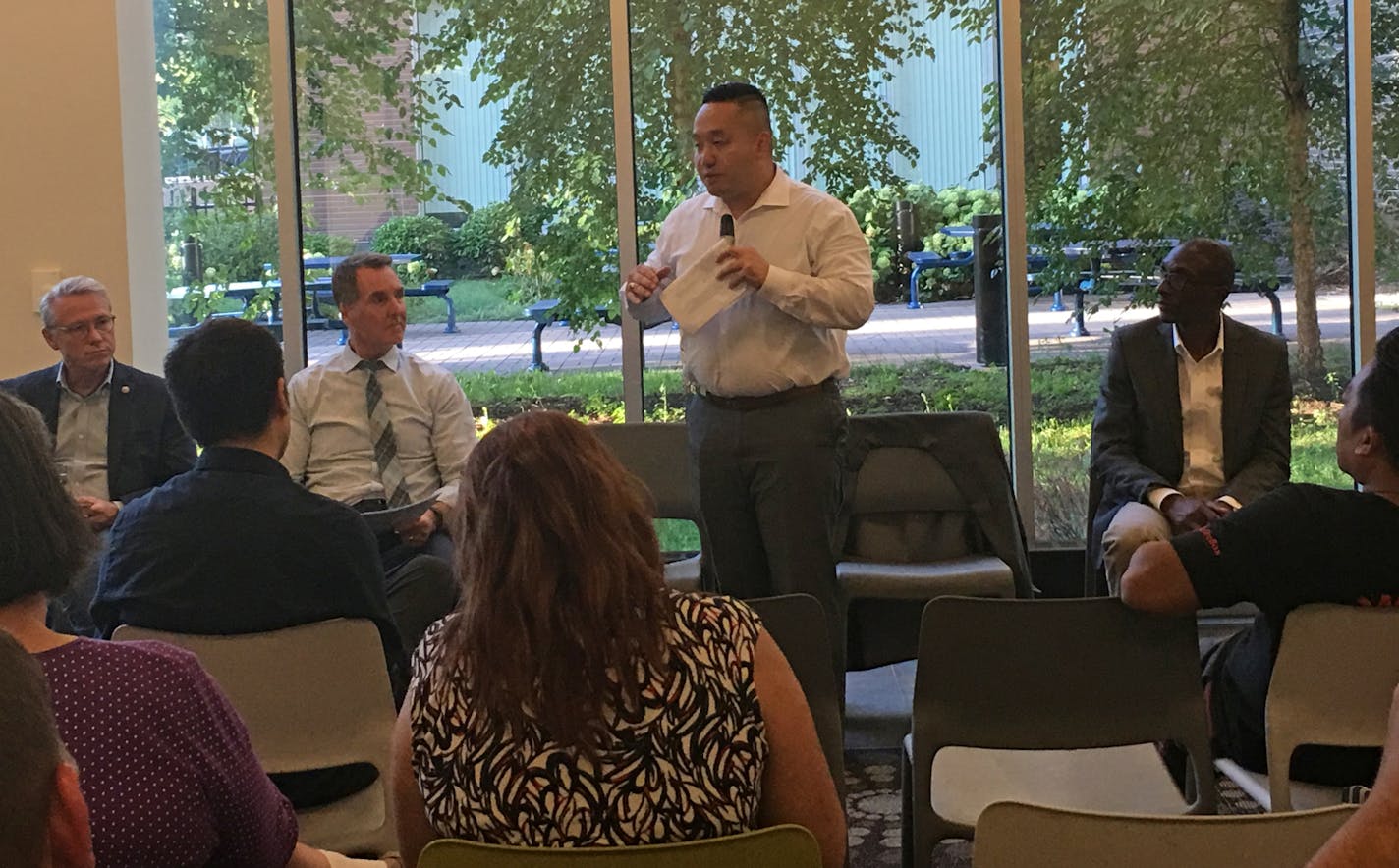 Right to left, Sen. Bobby Joe Champion, Rep. Fue Lee, Commissioner Matt Massman, Rep. Raymond Dehn. Speaking at a town hall meeting Wednesday night at the Davis Education Center in North Minneapolis.