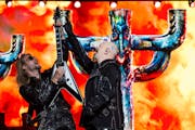 Rob Halford, right, and guitarist Richie Faulkner are touring with a new Judas Priest album after the band's Rock and Roll Hall of Fame induction.