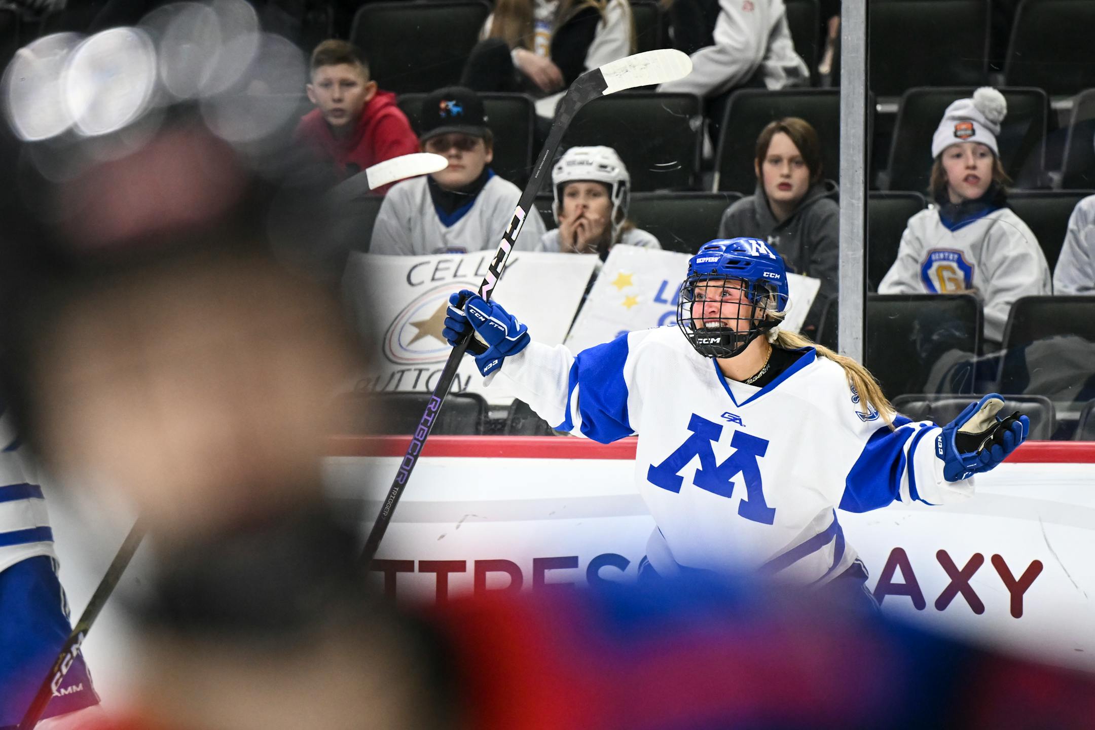 Minnetonka forward Molly Ryan (8) celebrates her goal against Gentry during the first period.