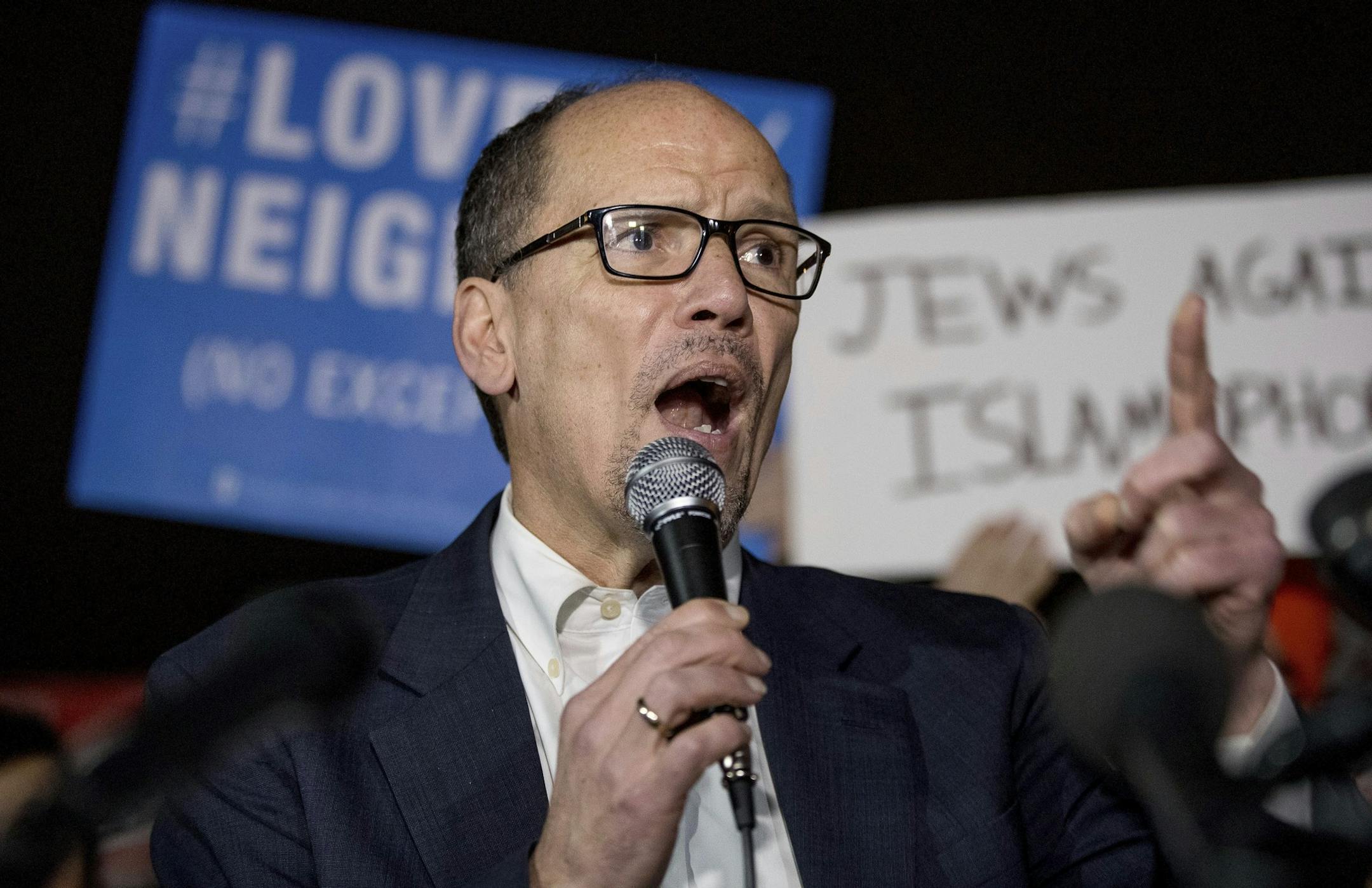 FILE - In this Monday, March 6, 2017, file photo, Democratic National Committee (DNC) Chairman Tom Perez speaks at a protest against President Donald Trump's new travel ban order in Lafayette Square outside the White House, in Washington. Former presidential candidate Bernie Sanders will headline a Louisville event aimed at helping re-energize Kentuckyís downtrodden Democratic Party. The Vermont senator will be joined by Perez at the event Tuesday, April 18, 2017. (AP Photo/Andrew Harnik, F