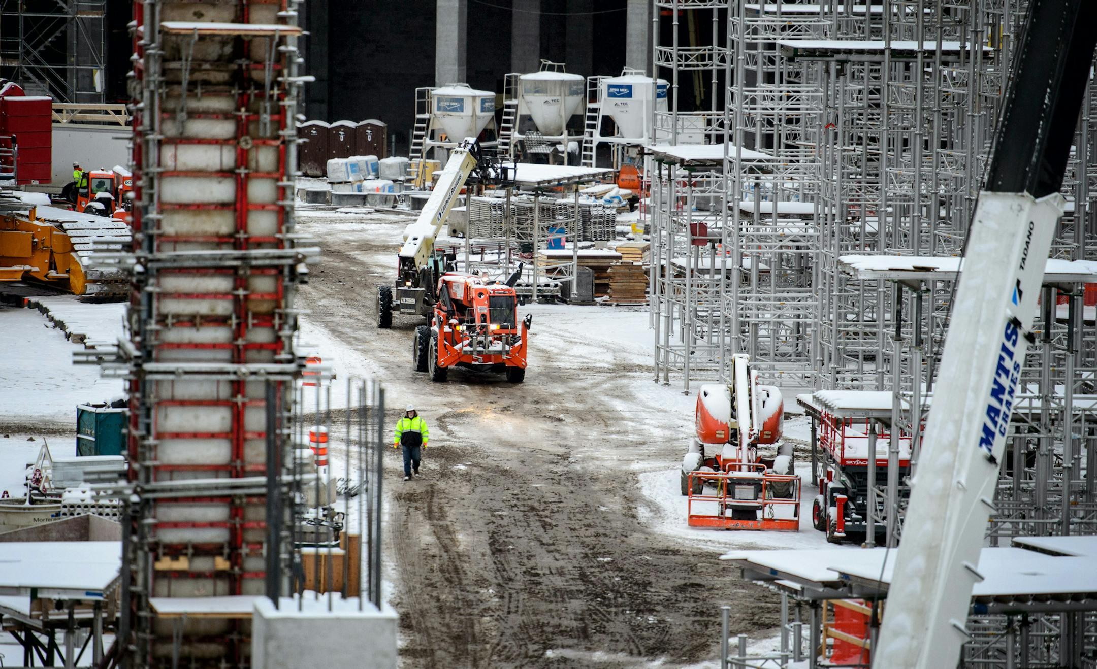Construction contunued in the new Vikings stadium despite the snow and sleet. ] GLEN STUBBE * gstubbe@startribune.com Monday, November 10, 2014 A winter storm arrived in the Twin Cities