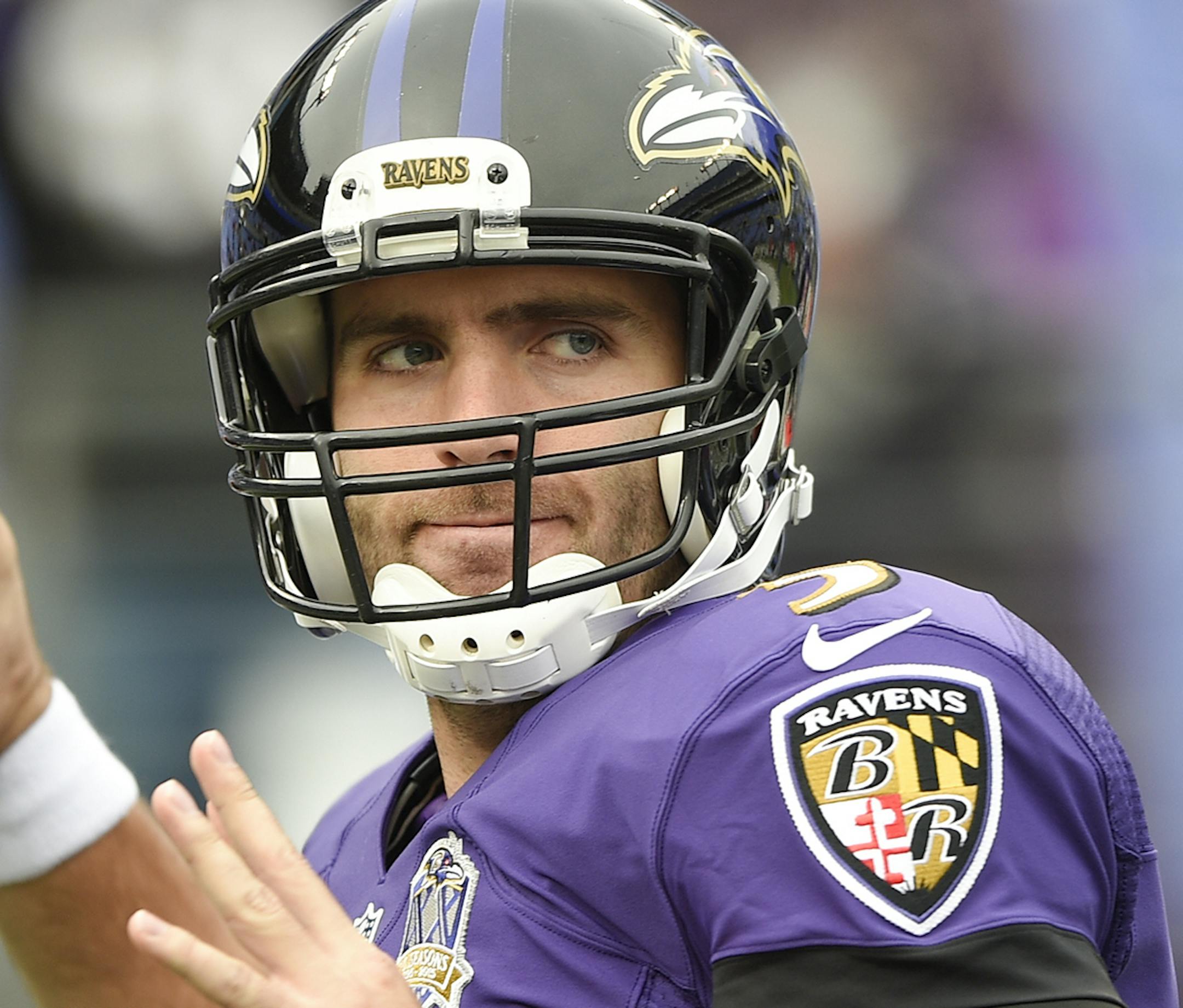 Baltimore Ravens quarterback Joe Flacco (5) warms up before an NFL football game against the St. Louis Rams in Baltimore, Sunday, Nov. 22, 2015. (AP Photo/Nick Wass) ORG XMIT: NYOTK020