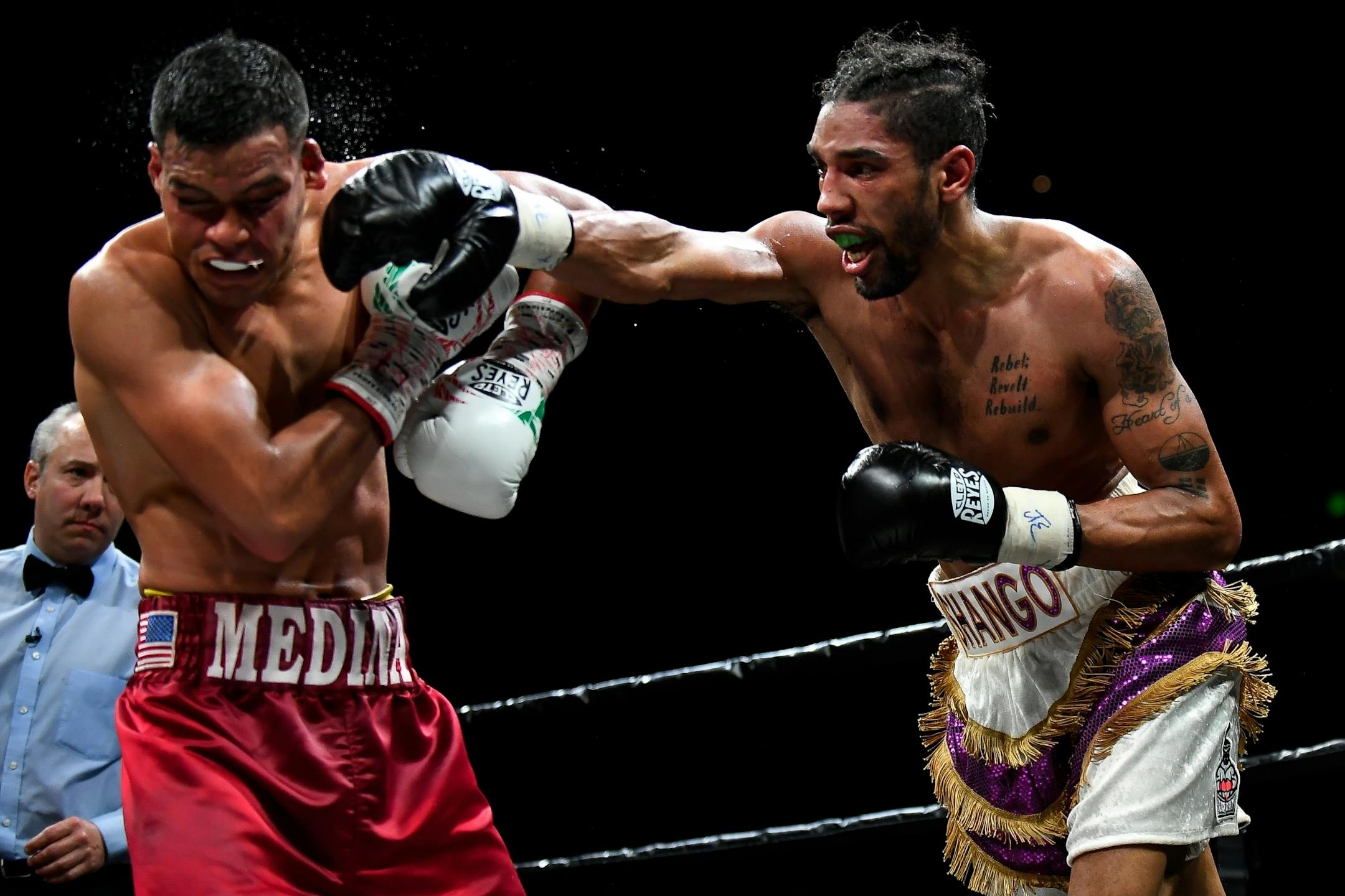 Jamal James, right, will take part in a professional boxing card next month at the Minneapolis Armory.