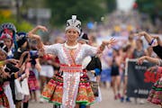 Thousands of Minnesotans lined a parade route in St. Paul on Aug. 8, 2021, to celebrate the Olympic triumph of Hmong American gymnast Suni Lee.