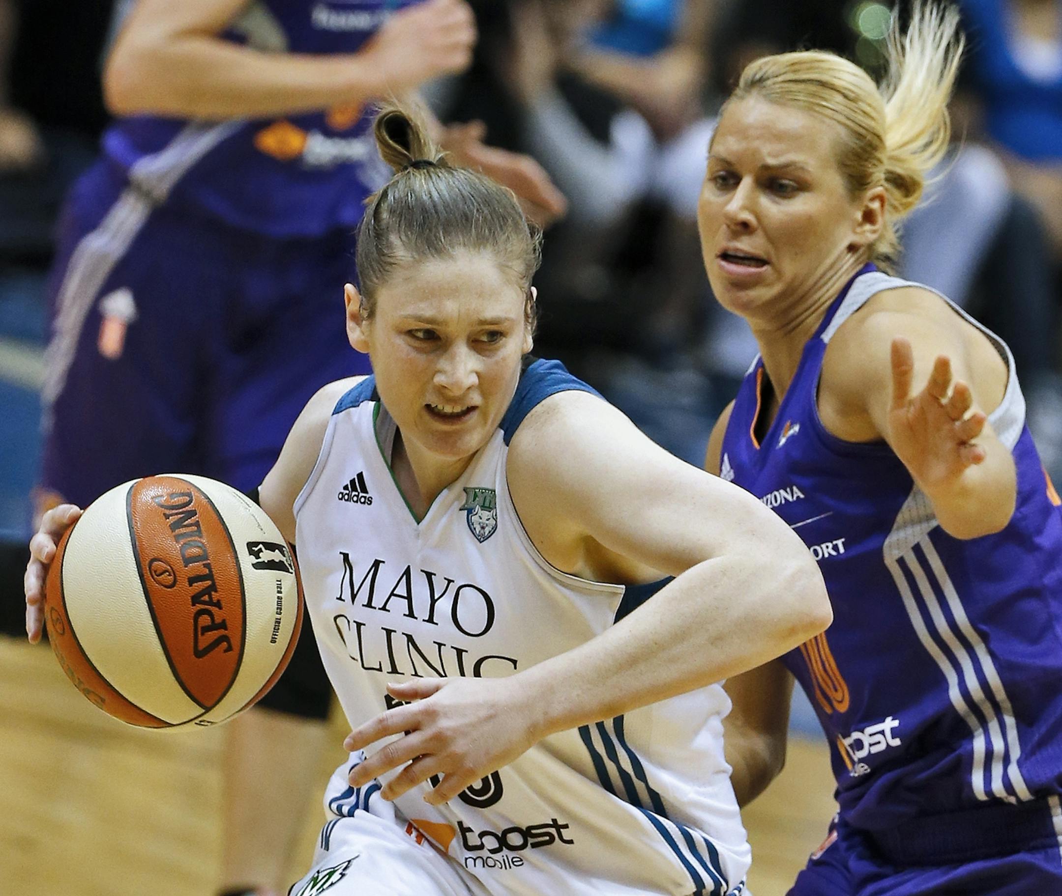 Lynx Lindsey Whalen attempted to drive by the defense of Phoenix Anete Jekabsone-Zogota.