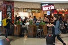 File photo of Aero Service Group's Barrio restaurant in Terminal 2 at Minneapolis-St. Paul International Airport. The company has reduced staffing at 
