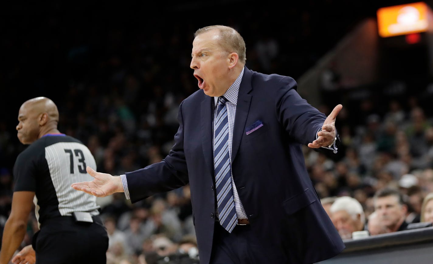 Timberwolves coach Tom Thibodeau argues a call during the first half of Wednesday night's season opener in San Antonio. The Wolves open the home schedule on Friday.