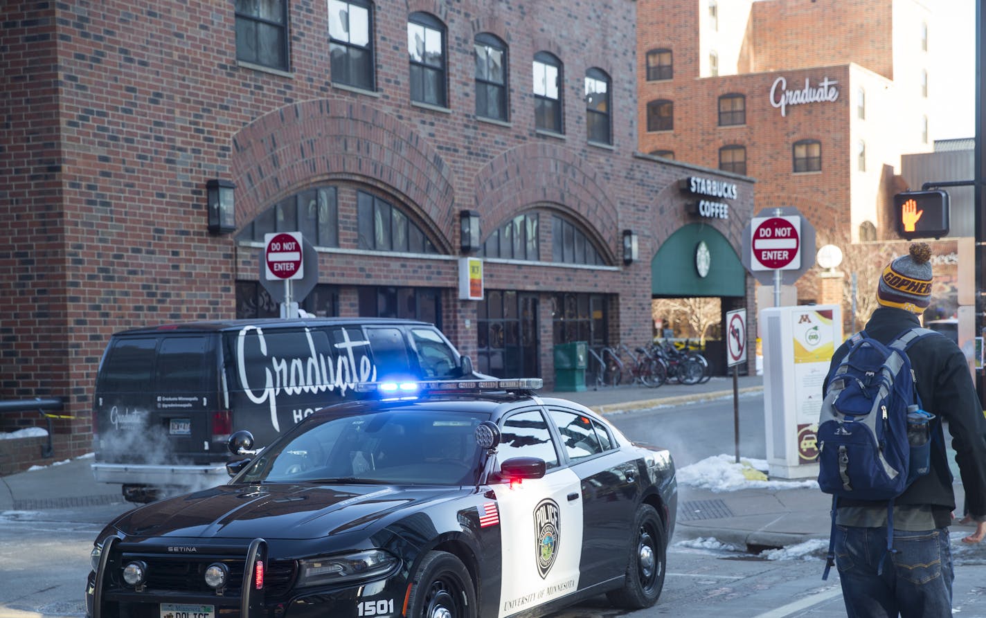 Police cars were parked outside the Graduate Hotel during a stand-off Monday, January 29, 2018 on the East Bank of the University of Minnesota in Minneapolis, Minn. The University of Minnesota has issued a safety alert Monday morning.