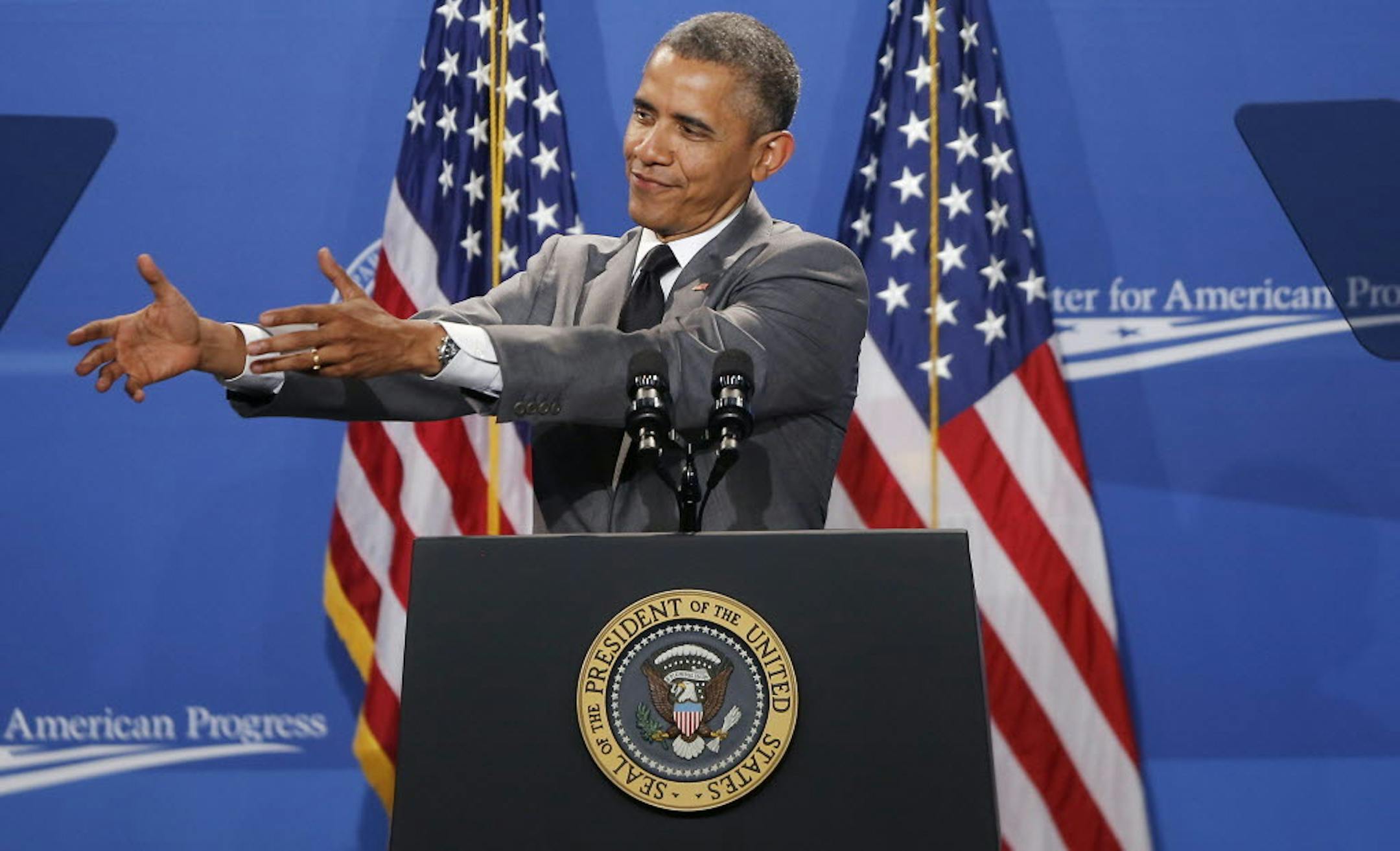 June 23, 2014: President Barack Obama mimics someone handing him a baby as he speaks at The White House Summit on Working Families.