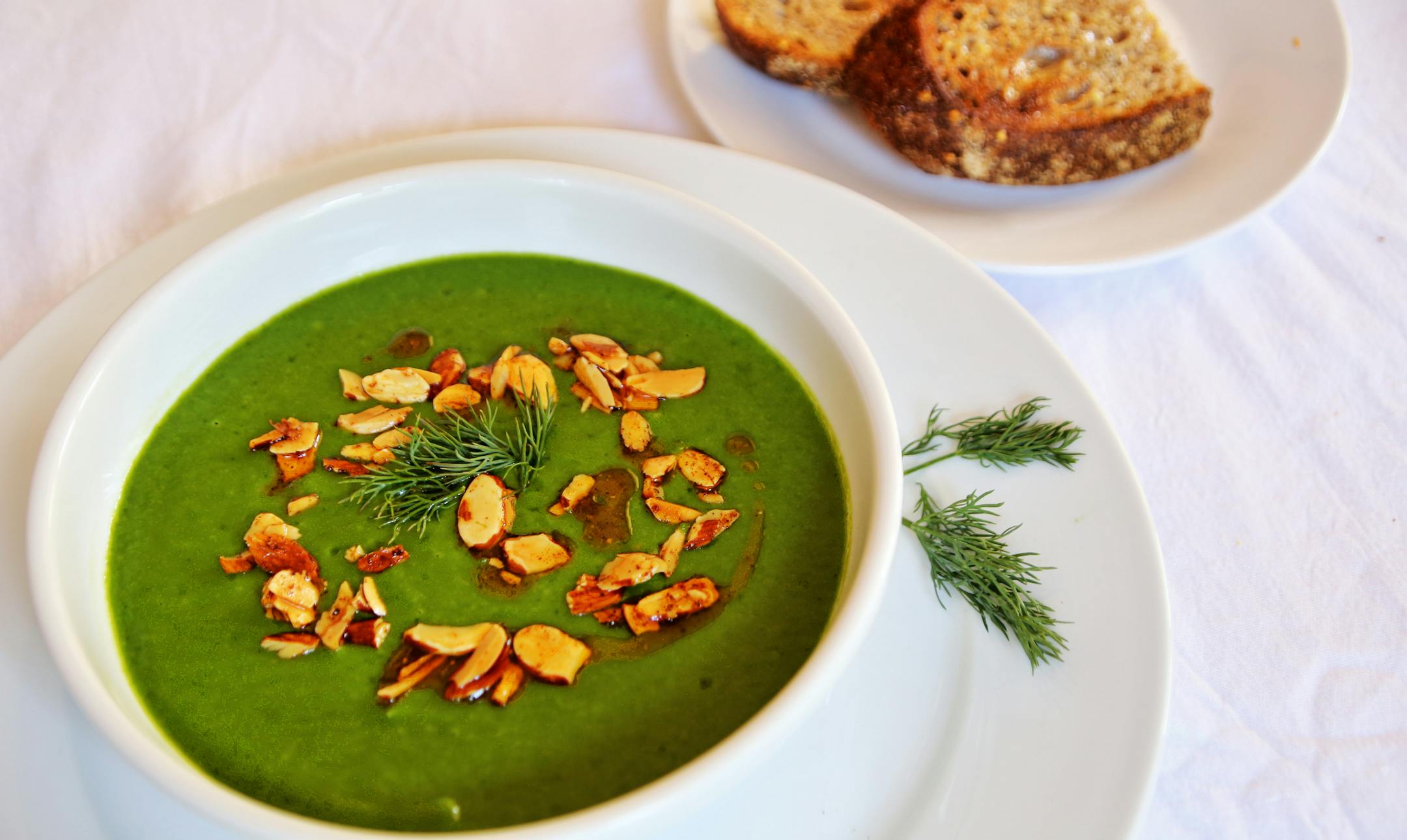 Creamy Spinach Soup with Dill and Paprika Almonds.
