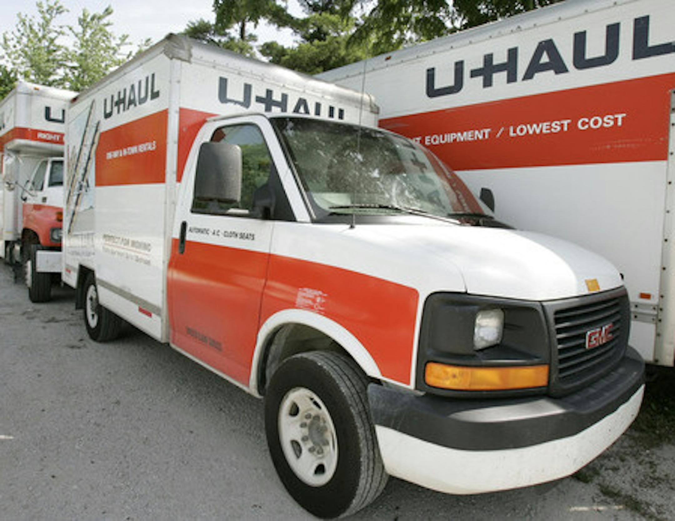 FILE - In this June 14, 2006 file photo are U-Haul trucks sit on a dealer lot in Des Moines, Iowa. U-Haul has a New Year's resolution: cut down on hiring people who smoke. The moving company said that it won't hire nicotine users in the 21 states where it is legal to do so, saying that it wants to ensure a "healthier workforce." The new policy will start Feb. 1, 2020. and won't apply to those hired before then. (AP Photo/Charlie Neibergall, File)