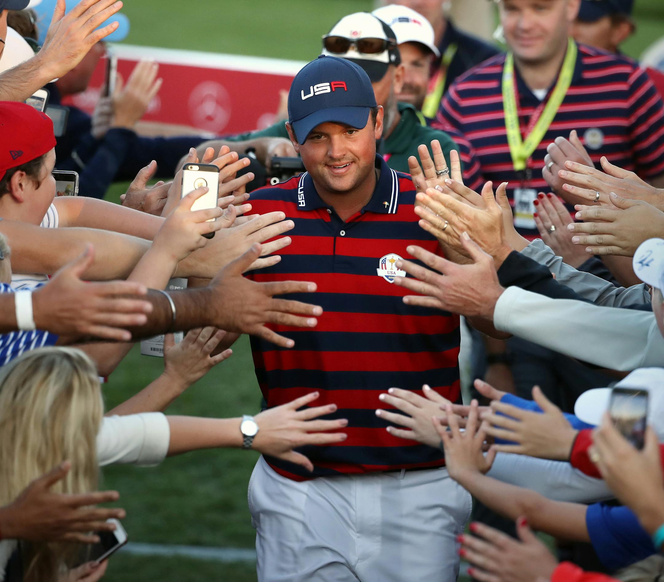 USA's Patrick Reed walks off the 17th hole to a crowd of cheering fans after winning the match. Reed was paired up with Jordan Speith. ] 2016 Ryder Cup, Hazeltine National Golf Club.
brian.peterson@startribune.com
Chaska, MN 10/01/16