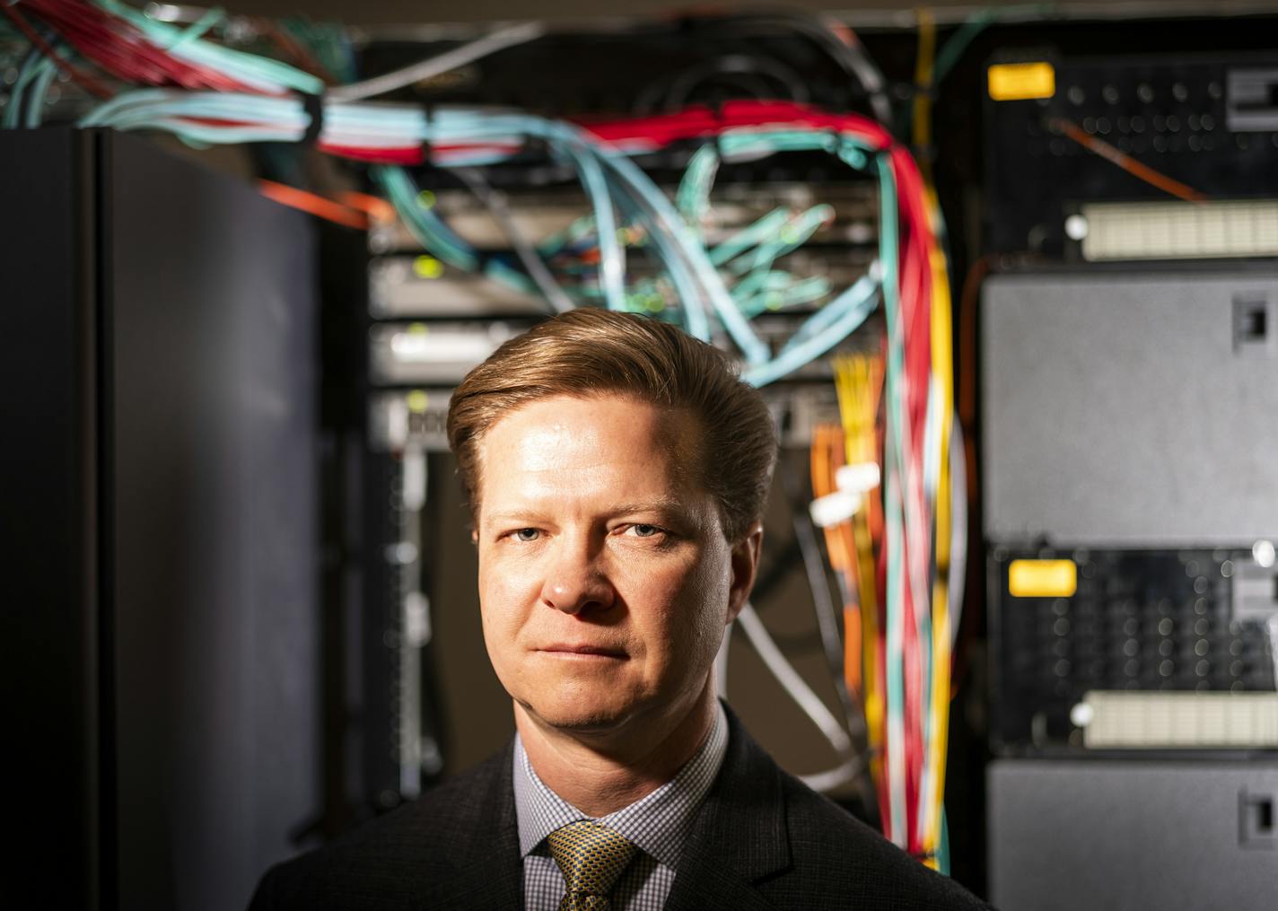 Bill Ekblad, the new "cyber navigator" for the Minnesota Secretary of State's Office, posed for a portrait inside the Secretary of State's computer room. ] LEILA NAVIDI &#x2022; leila.navidi@startribune.com BACKGROUND INFORMATION: Bill Ekblad is the new "cyber navigator" hired by the Minnesota Secretary of State's Office. Ekblad was photographed inside the Secretary of State's computer room in St. Paul on Wednesday, February 12, 2020.