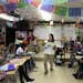 Rachel Pierce, an eighth-grade Spanish teacher at Forest Lake Southwest Junior High, sang Christmas songs in Spanish with her students. Usually public