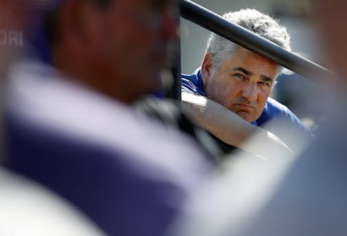 Minnesota Vikings radio play by play announcer Paul Allen listened to head coach Mike Zimmer made his way to the podium for a press conference after the injury of quarterback Teddy Bridgewater at practice on Tuesday.