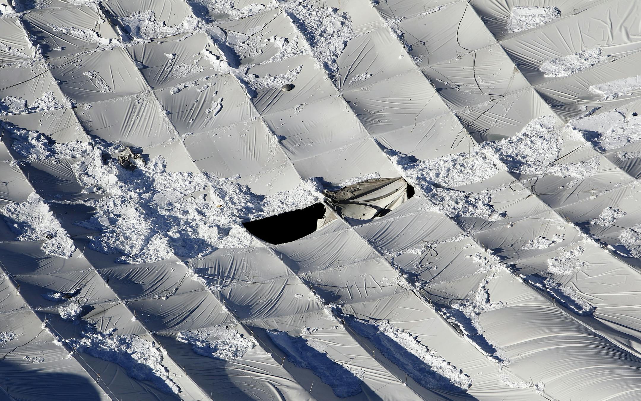The roof of Mall of America Field / The Metrodome in Minneapolis, Minn. collapsed due to the heavy snow. The Game between the Minnesota Vikings and New York Giants was rescheduled and will be played in Detroit on Monday night.