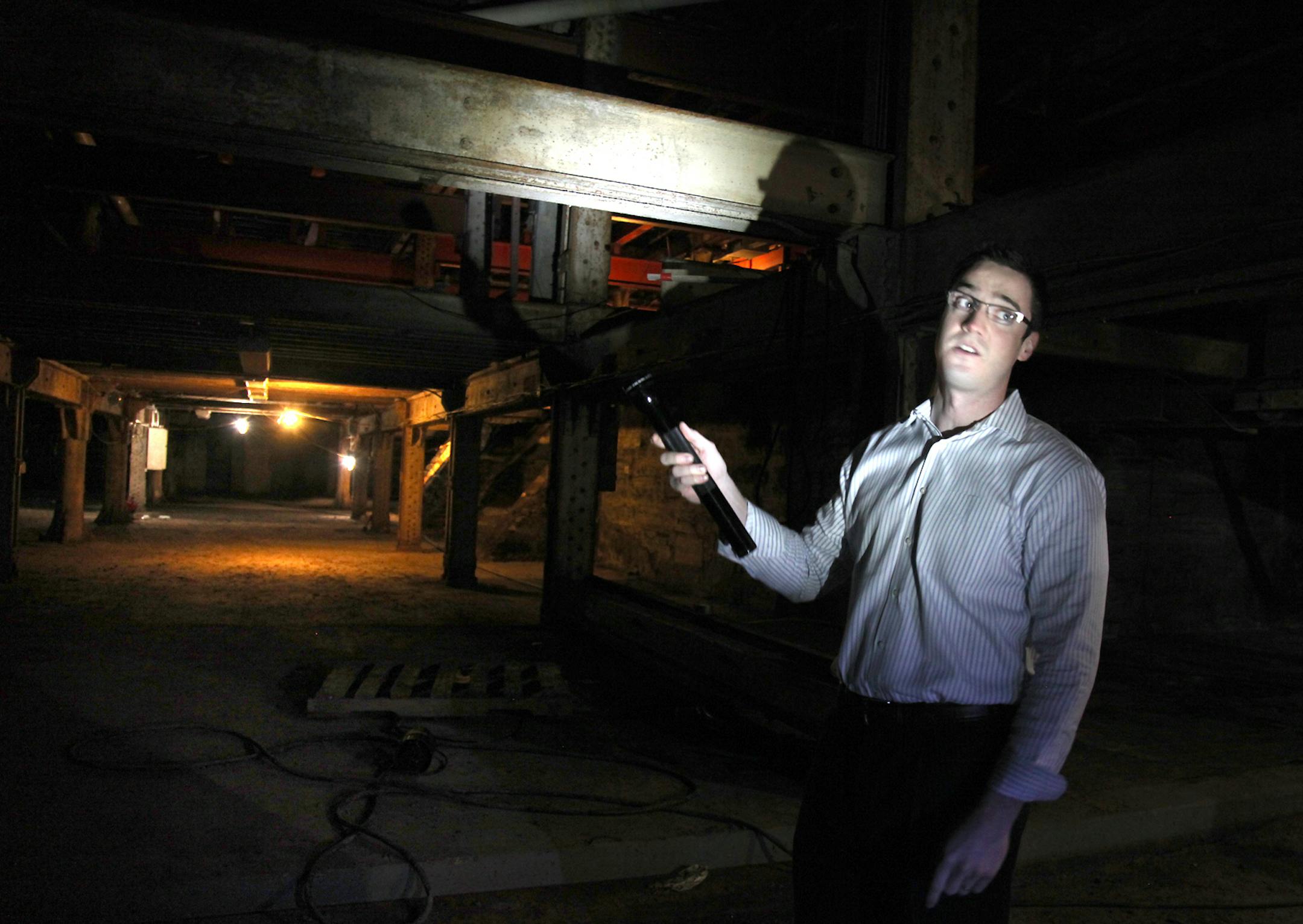 Owen Metz gave a tour of the Pillsbury A-Mill, Wednesday, March 21, 2012. At a cost of $100 million, renovating the now-decrepit Pillsbury A-Mill will be no easy feat. Dominium, a Plymouth-based apartment company, is getting final approval to turn the historic mill buildings into rental apartments for low-income artists.(ELIZABETH FLORES/STAR TRIBUNE) ELIZABETH FLORES • eflores@startribune.com