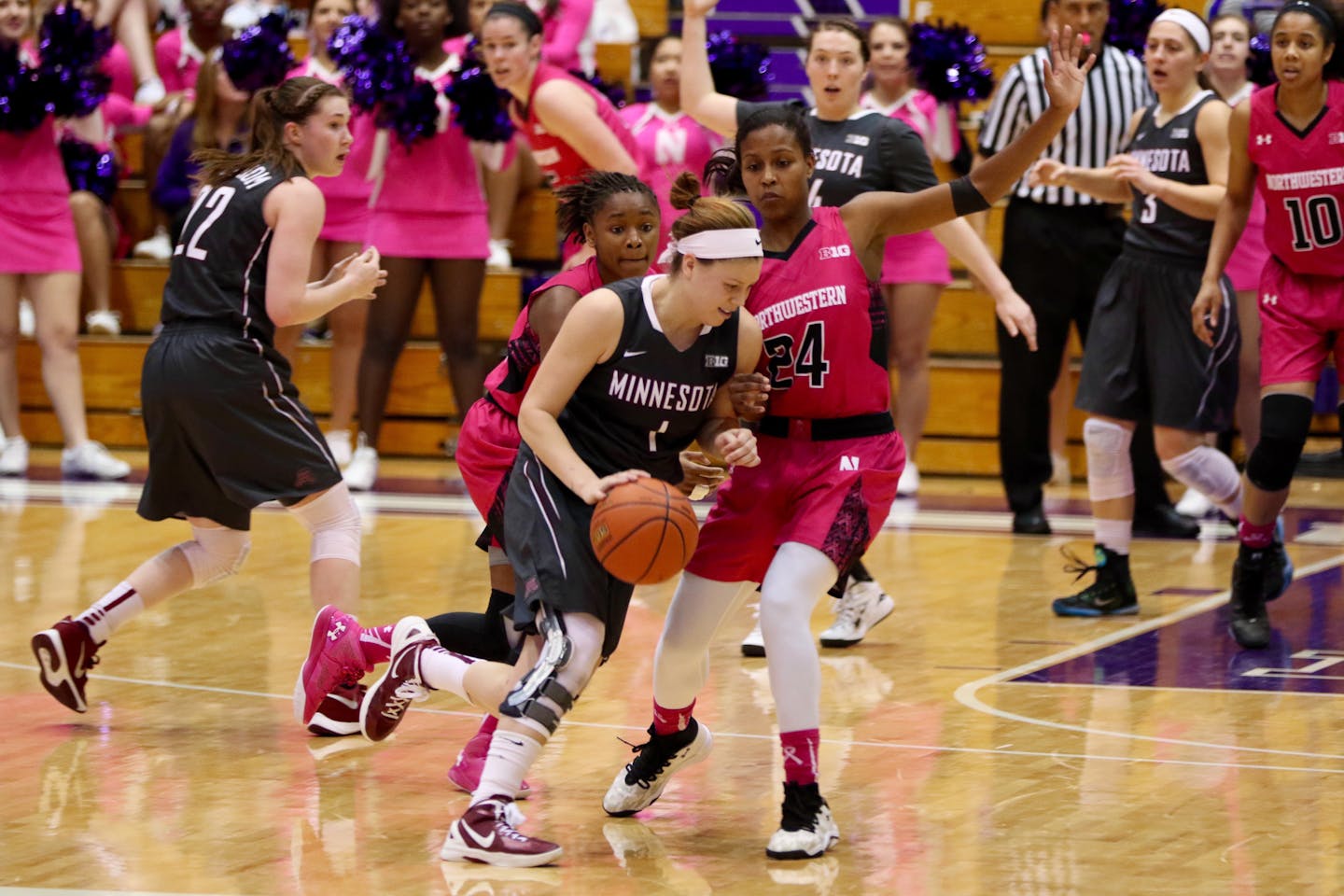 Gophers senior guard Rachel Banham (dribbling) tied an NCAA Division I women's basketball record for points in a game with 60 in the Gophers' 112-106 double-overtime victory over Northwestern on Sunday at Welsh-Ryan Arena.