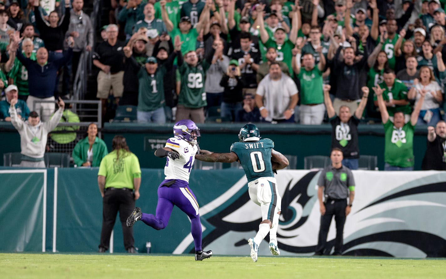 D'Andre Swift (0) of the Philadelphia Eagles is chased by Minnesota Vikings linebacker Josh Metellus (44) during a long run in the fourth quarter Thursday, September 14, 2023, Lincoln Financial Field in Philadelphia, Pa. ] CARLOS GONZALEZ • carlos.gonzalez@startribune.com