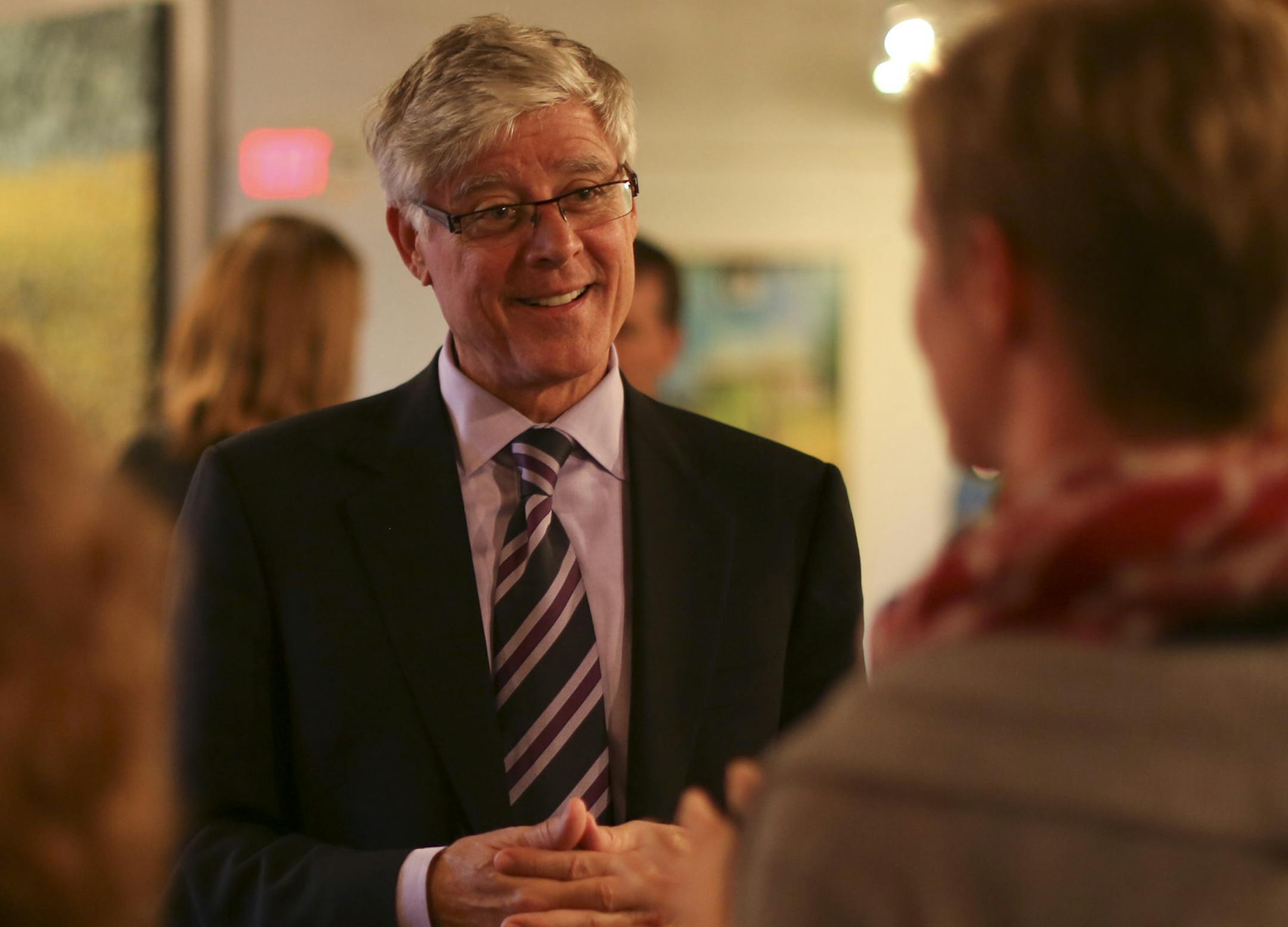 Minneapolis mayoral candidate Mark Andrew chatted Thursday at an event for City Council Member Kevin Reich.