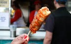 The Giant Egg Roll on a Stick at Que Viet at the Minnesota State Fair. Photo by Mark Vancleave
