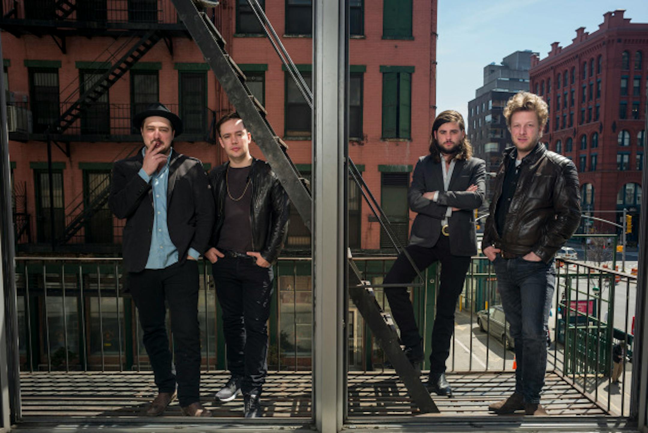 From left, Marcus Mumford, Ben Lovett, Winston Marshall and Ted Dwane of the band Mumford & Sons pose for a portrait in promotion of their forthcoming album "Wilder Mind" on Monday, April 6, 2015 in New York. (Photo by Drew Gurian/Invision/AP) ORG XMIT: INVW