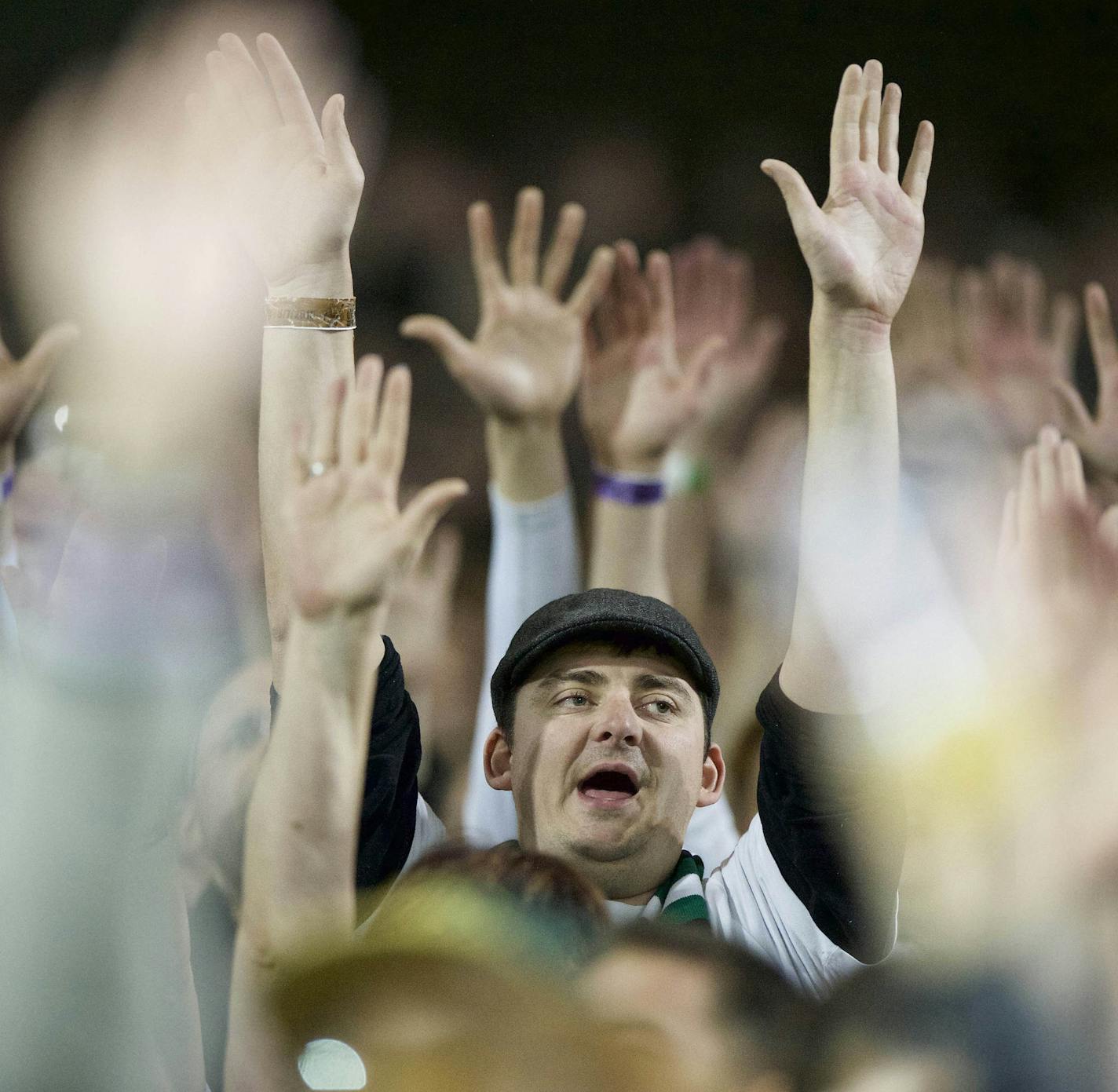 A Portland Timbers fan cheers before an MLS soccer game between the Timbers and Real Salt Lake on Saturday, March 7, 2015, in Portland, Ore. (AP Photo/Troy Wayrynen) ORG XMIT: MIN2015032721553255