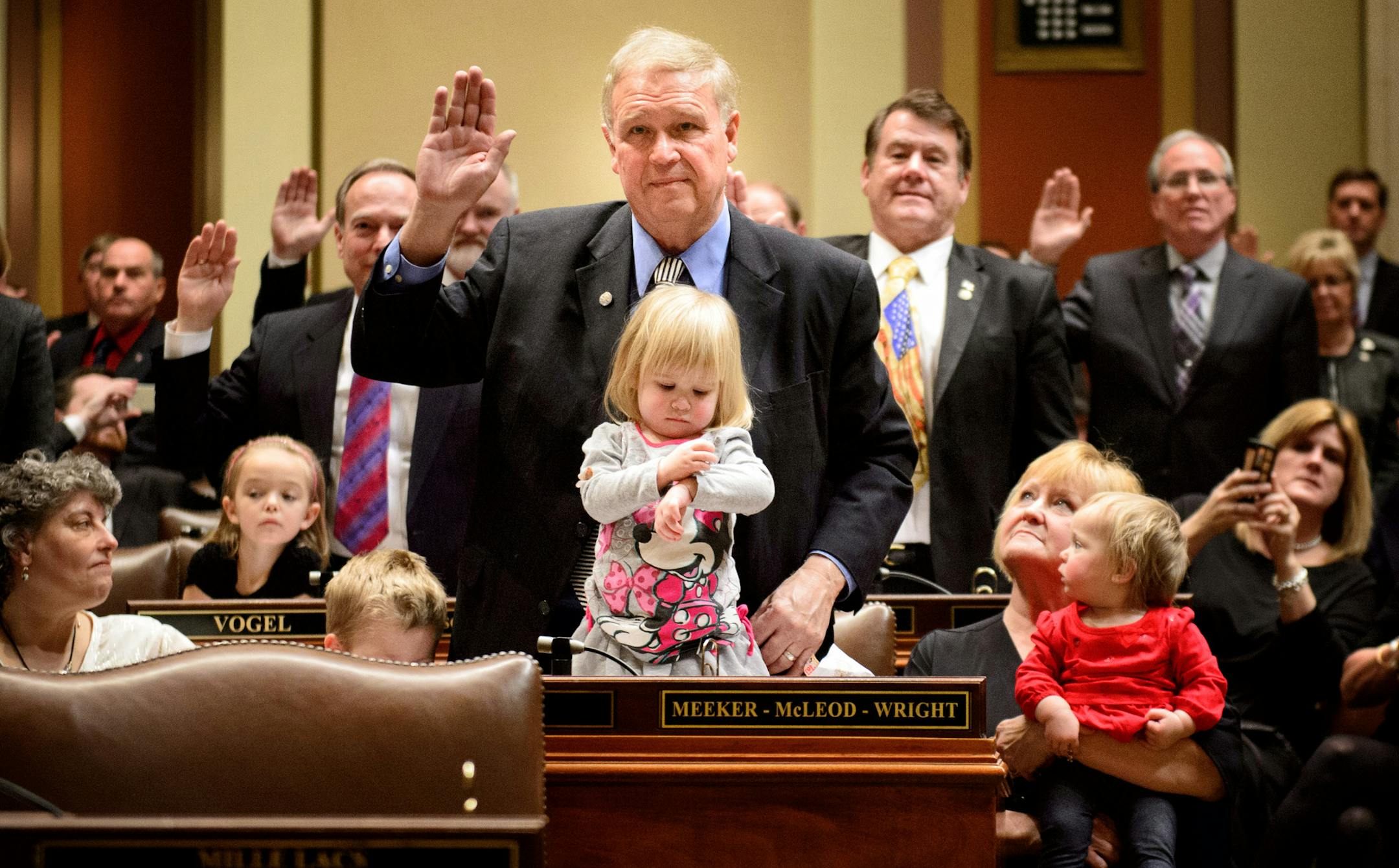 Rep. Dean Urdahl was among the House members sworn in with his grandchildren Mason, seated, Bernadette, 2 and Veronica, 1, held by Karen Urdahl, Dean's wife. ] GLEN STUBBE * gstubbe@startribune.com Tuesday, January 6, 2015 The Minnesota House and Senate re-convene, with much ceremony, family and guests. In the House, Speaker Kurt Daudt will take the gavel back for the GOP.