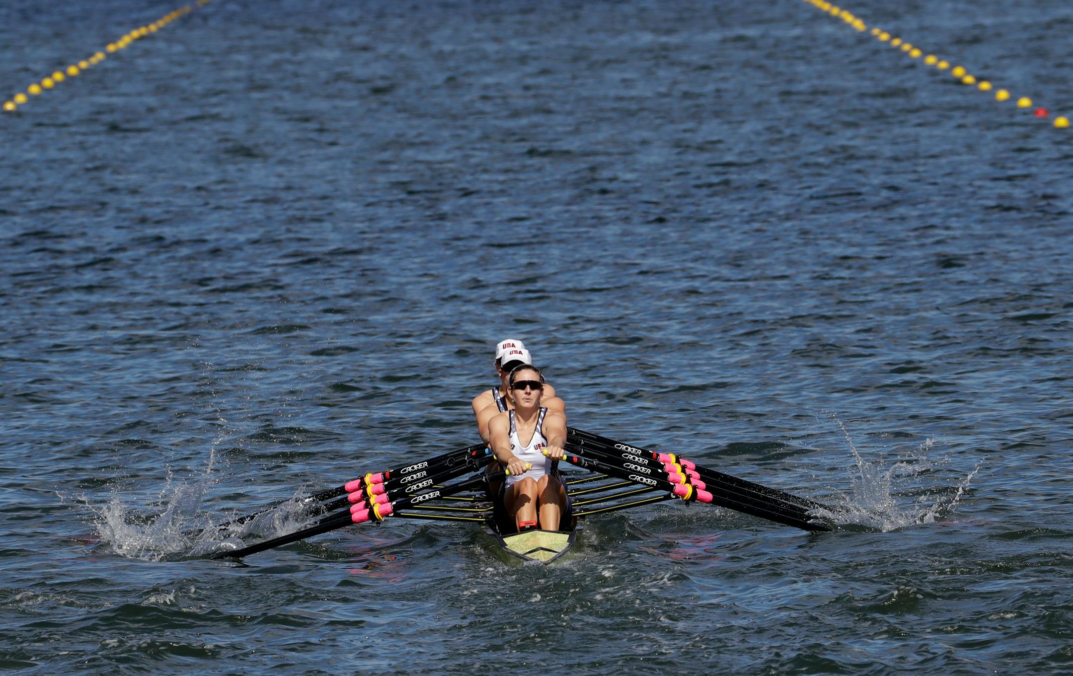 Grace Latz, Tracy Eisser, Megan Kalmoe and Adrienne Martelli, of United States, compete in the women's rowing quadruple sculls final during the 2016 Summer Olympics in Rio de Janeiro, Brazil, Thursday, Aug. 11, 2016. (AP Photo/Andre Penner)