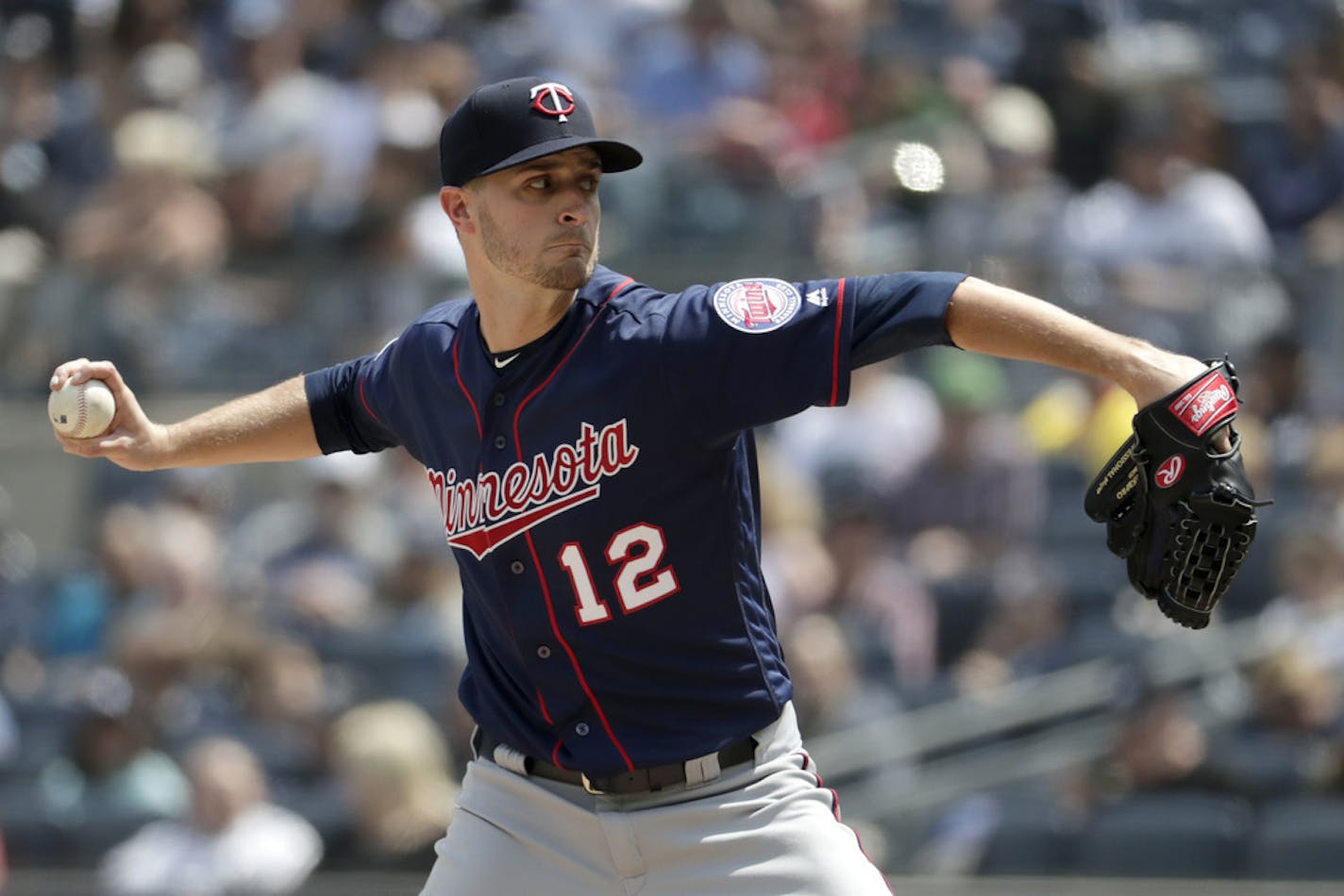 Minnesota Twins starting pitcher Jake Odorizzi throws a pitch to New York Yankees' Mike Tauchman during the third inning of a baseball game, Saturday, May 4, 2019, in New York. (AP Photo/Julio Cortez)