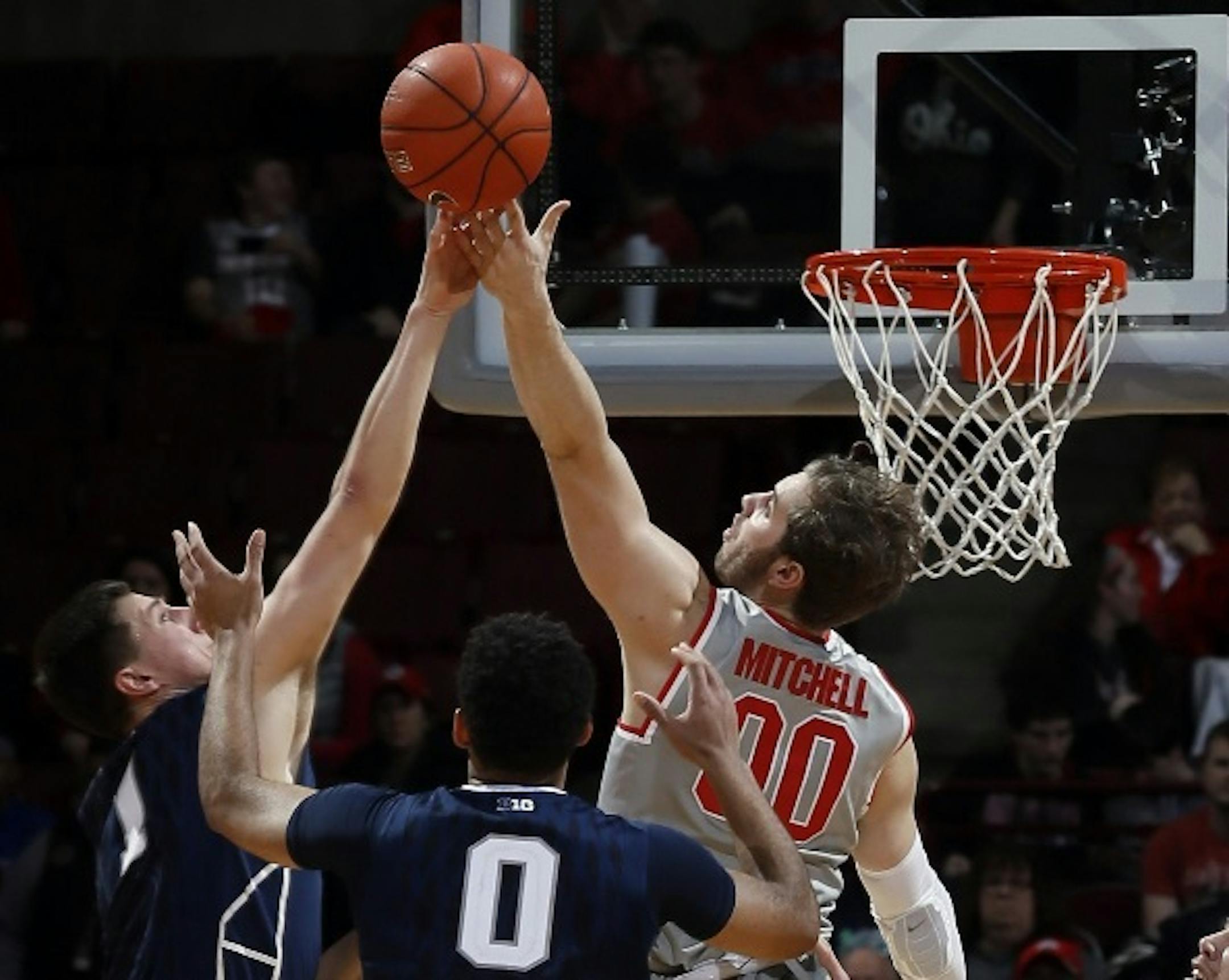 Ohio State forward Mickey Mitchell blocked the shot of Penn State forward Deividas Zemgulis during the second half Monday.