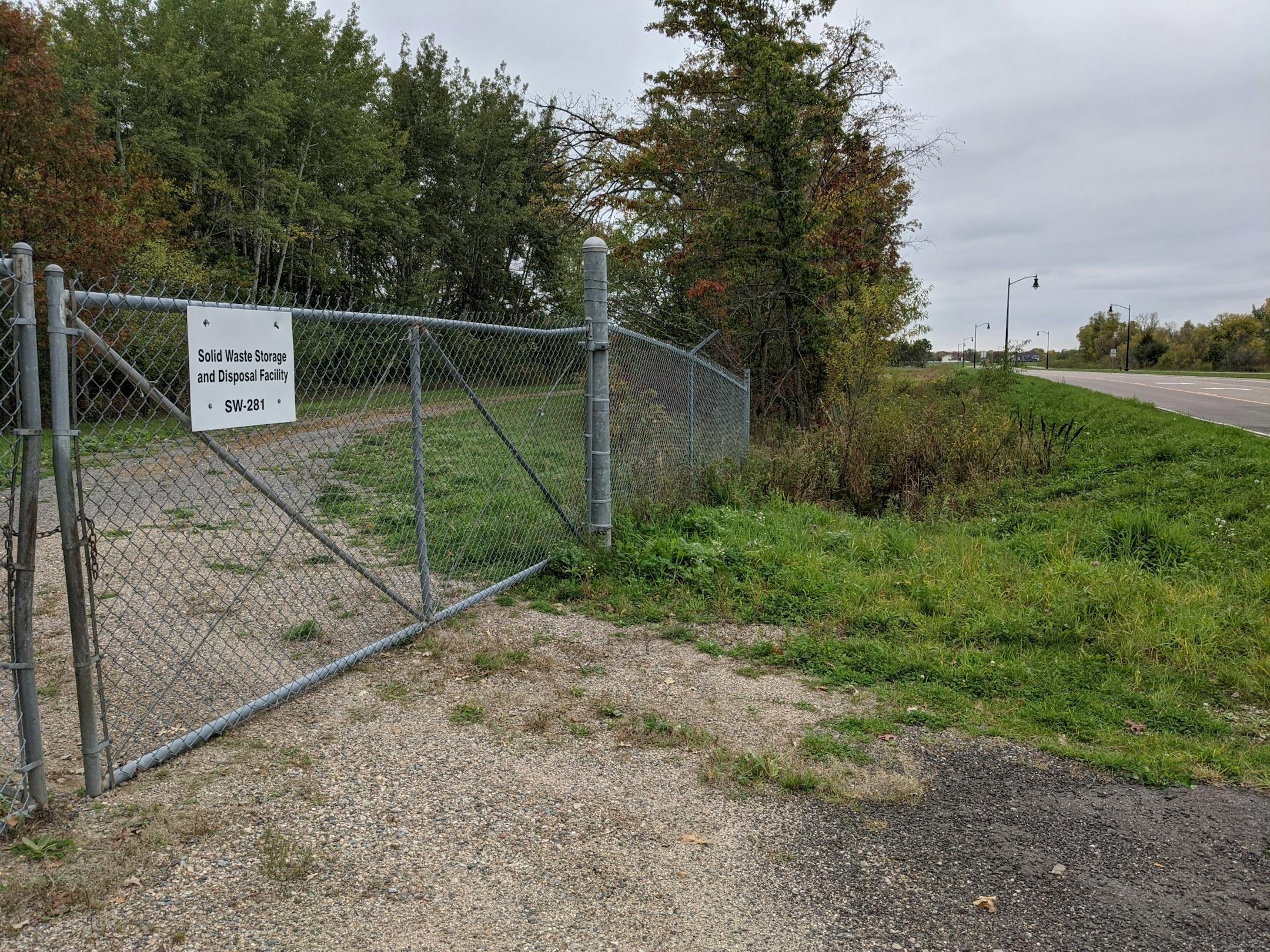 A sign along Fourth Avenue in Sartell shows the entrance to a landfill. (Credit: Jenny Berg)
