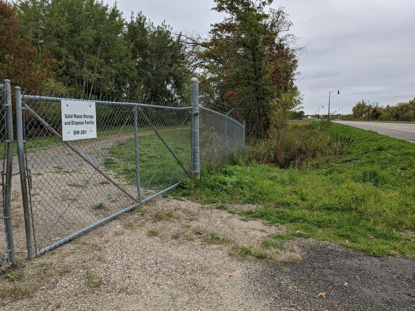 A sign along Fourth Avenue in Sartell shows the entrance to a landfill. (Credit: Jenny Berg)