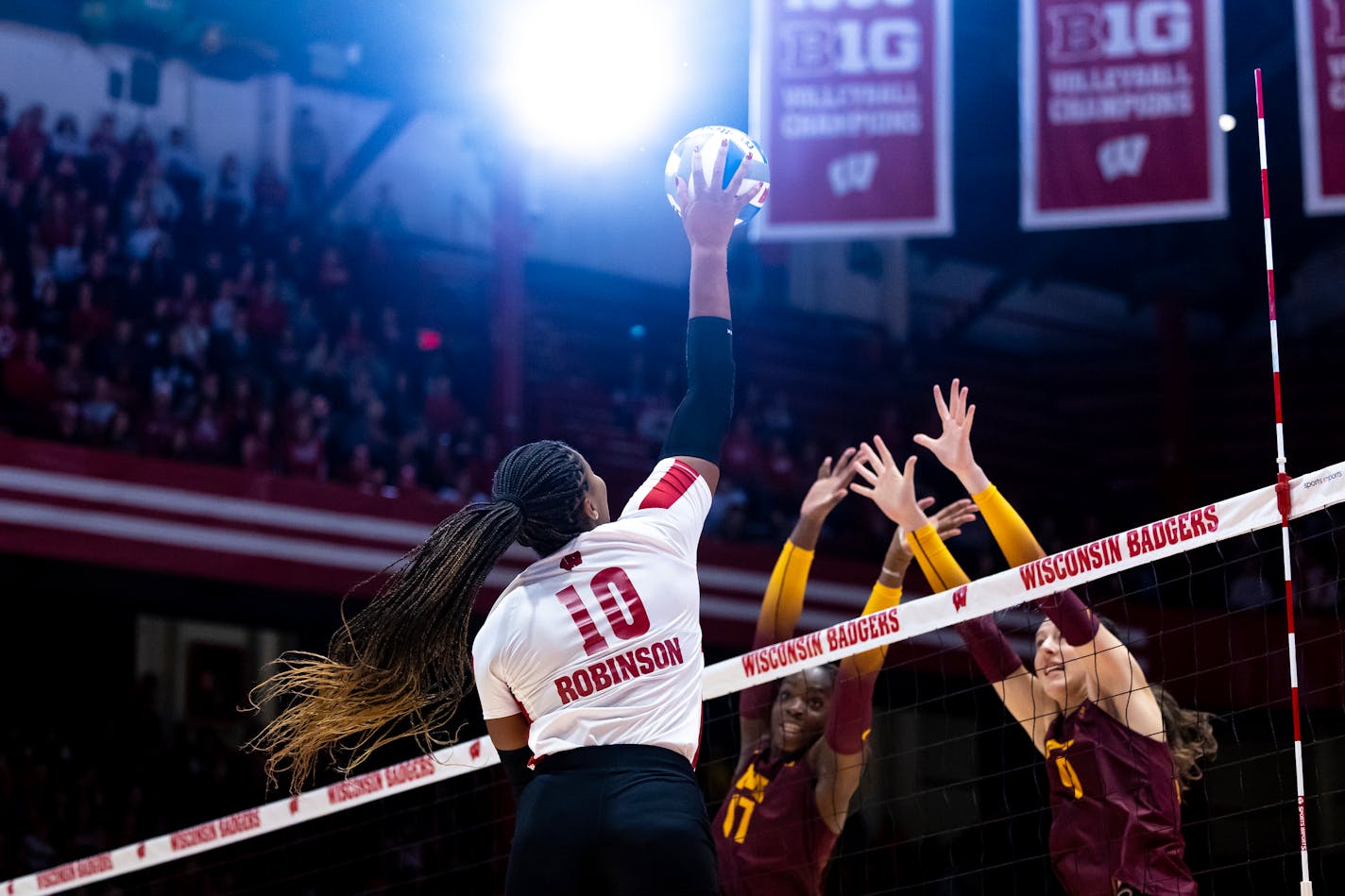 Wisconsin Devyn Robinson (10) spikes the ball in the first set against Minnesota during an NCAA college volleyball match in Madison, Wis., Sunday, Oct. 29, 2023. (Samantha Madar/Wisconsin State Journal via AP)