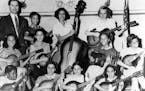 Albert Bellson with his music students in the Rondo neighborhood of St. Paul. Former students said Bellson was formal and meticulous. He gave the Rond