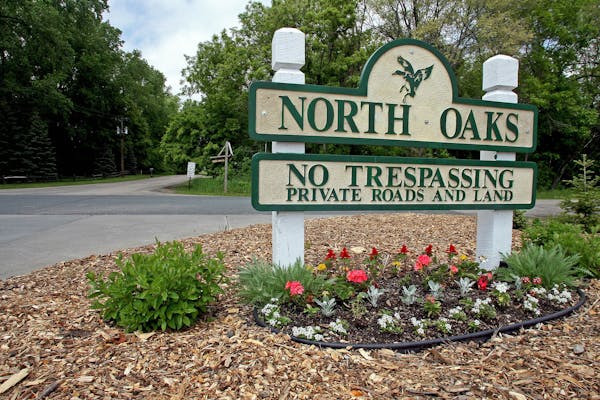 This 2008 photo shows a sign posted at an entrance to North Oaks informing the public about private land within.