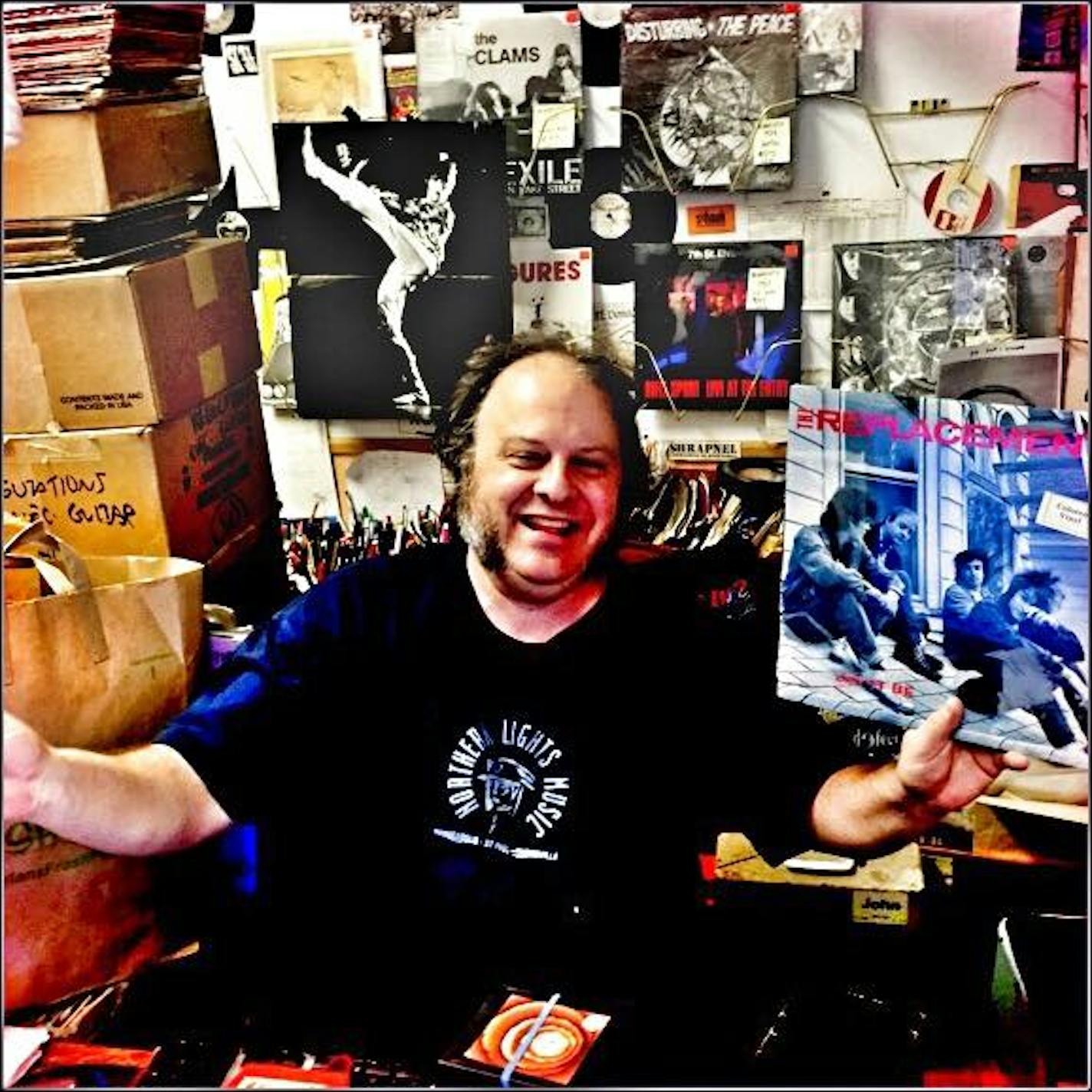 John Kass holding the last of the original "Let It Be" vinyl. / Photo by Chris Strouth