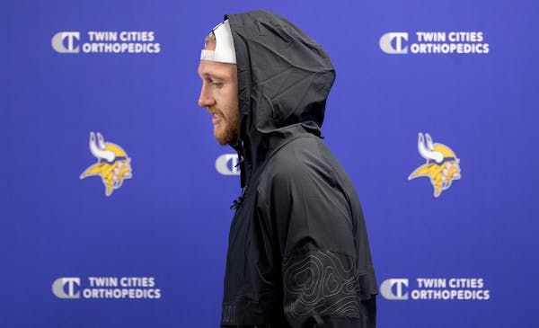 Minnesota Vikings’ tight end T.J. Hockenson takes to the podium for a news conference Monday at the TCO Performance Center in Eagann.