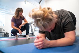 Nell Hurley led Megan Vanderbilt through a strength training circuit in her in-home studio on Tuesday, September 14, 2021. ] ALEX KORMANN • alex.kor