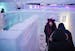 Malissa Medina helps Kevin Sullivan, who uses a walker, navigate the Minnesota Ice Maze in Eagan on Jan. 12, 2023. The maze will be bigger in 2024. 