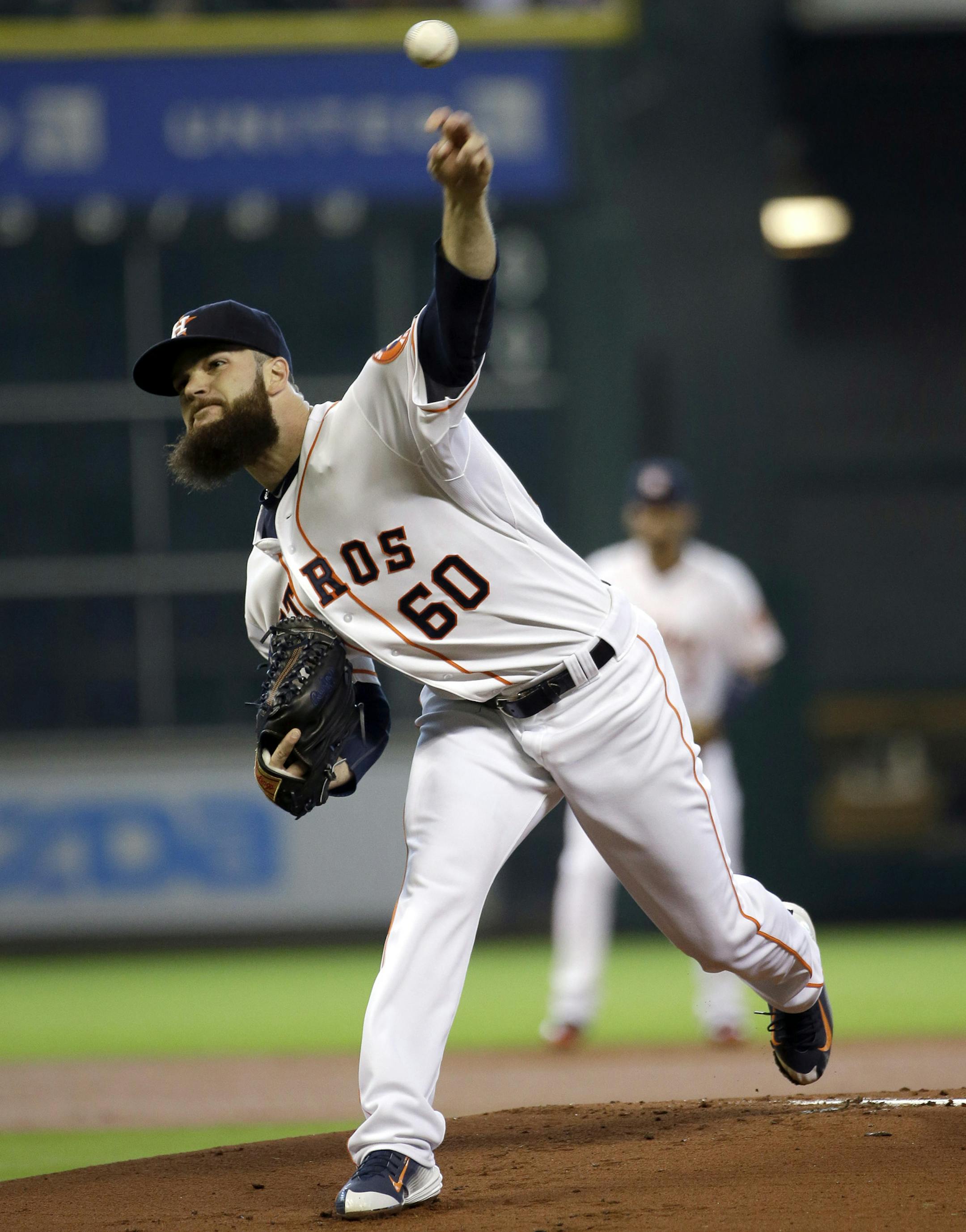 Houston Astros' Dallas Keuchel throws against the Chicago White Sox during the first inning of a baseball game Saturday, May 30, 2015, in Houston. (AP Photo/David J. Phillip)