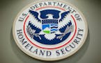 The Department of Homeland Security logo is seen during a news conference in Washington, Feb. 25, 2015. 