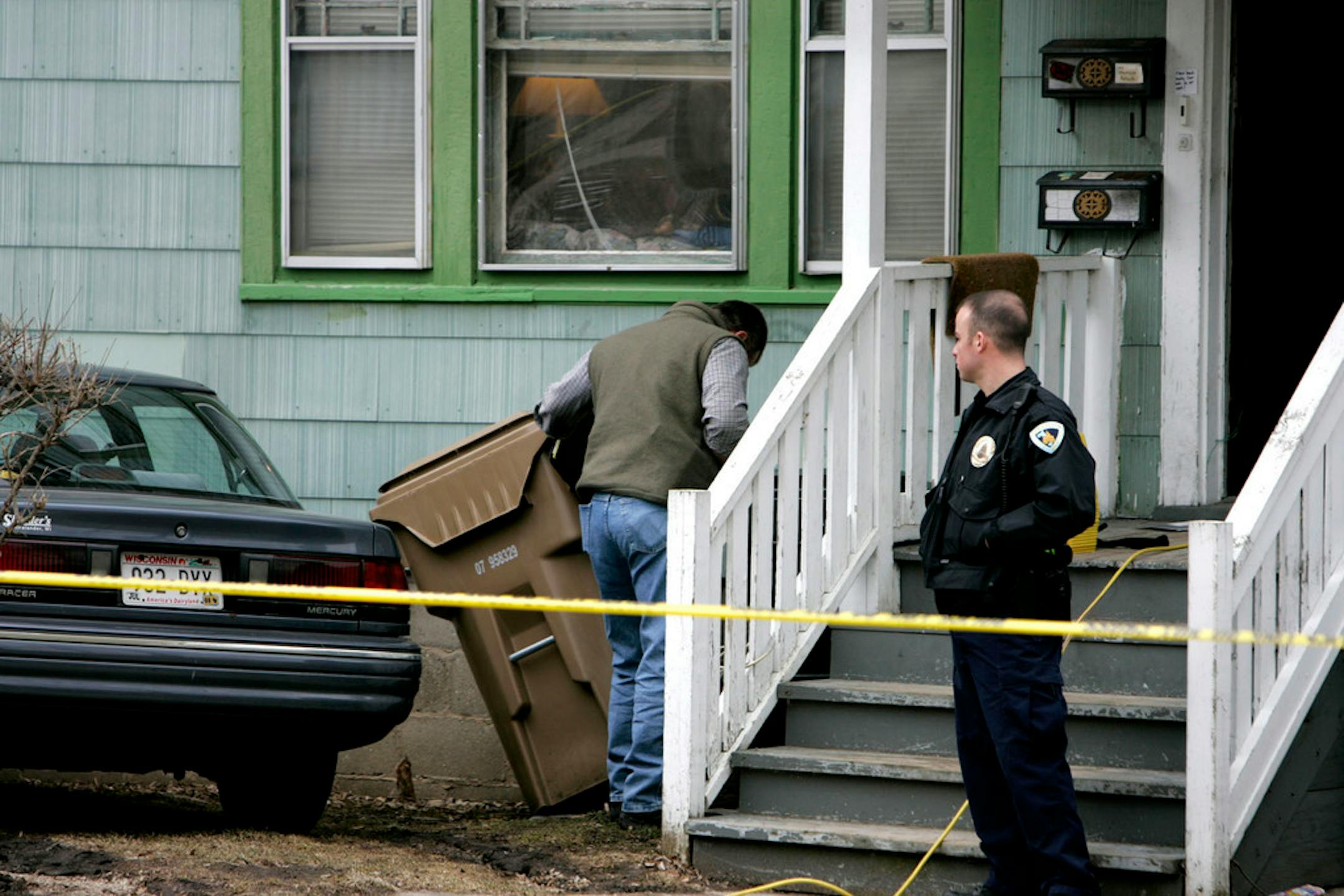 Madison police searched in and around trash containers in their investigation of the 2008 killing of Brittany Sue Zimmermann, 21, at 517 W. Doty St. on in Madison, Wis.