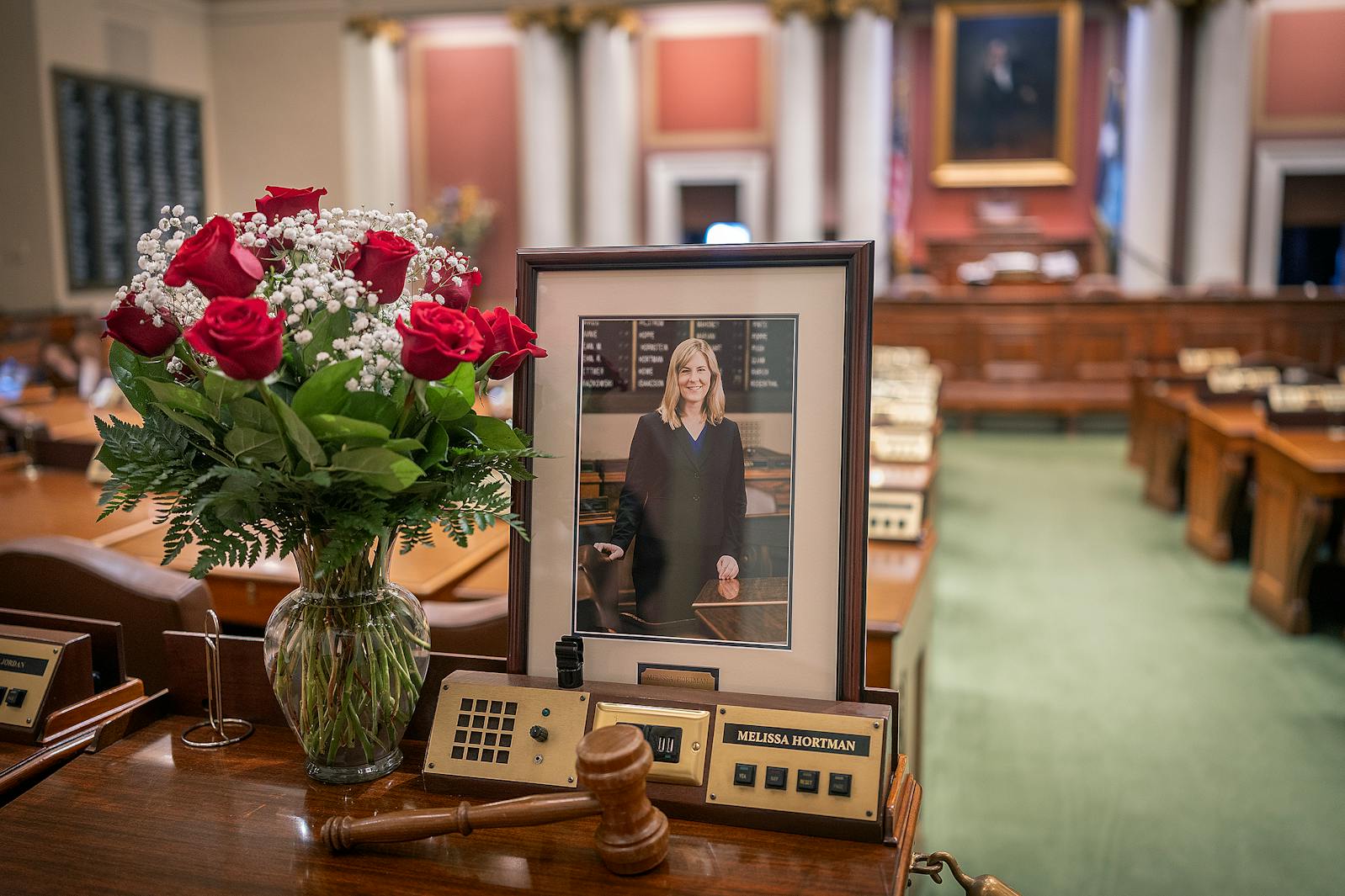 Flowers, a portrait and a gavel were left Sunday at Minnesota House Democratic leader Melissa Hortman’s desk in the House chambers in the State Capitol in St. Paul.  