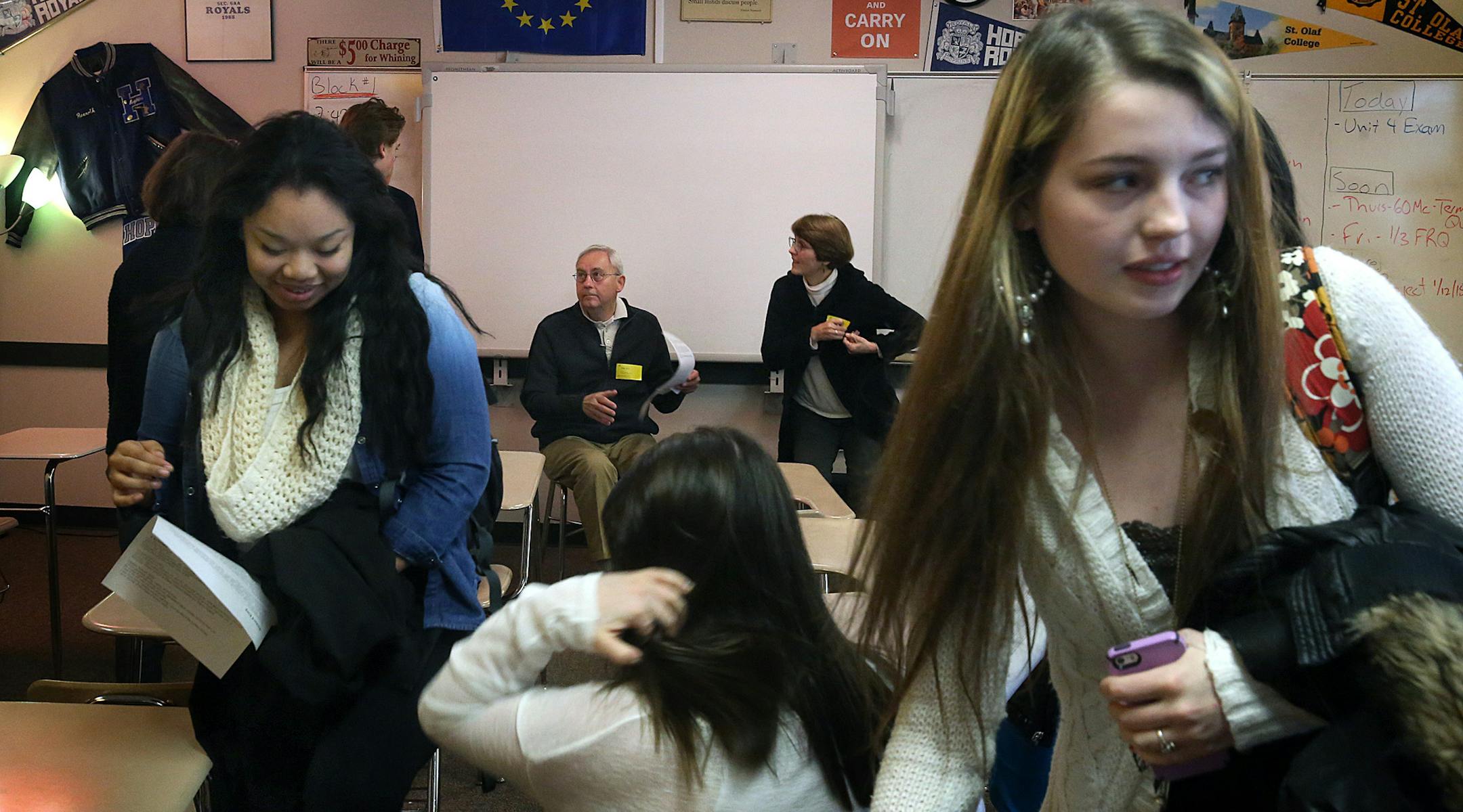 Dr. Allan Kind (seated, left), MD (internal medicine and infectious diseases at Park Nicollet Medical Center) and Dr. Chris Meyer, MD (pediatric intensive care at the University of Minnesota) continued to talk with students as the class period ended. ] JIM GEHRZ ‚Ä¢ james.gehrz@startribune.com / Minneapolis, MN / December 18, 2014 /8:50 AM BACKGROUND INFORMATION: Three retired doctors will be talking to students in Rick Rexroth's social studies class at Hopkins High School. Hopk