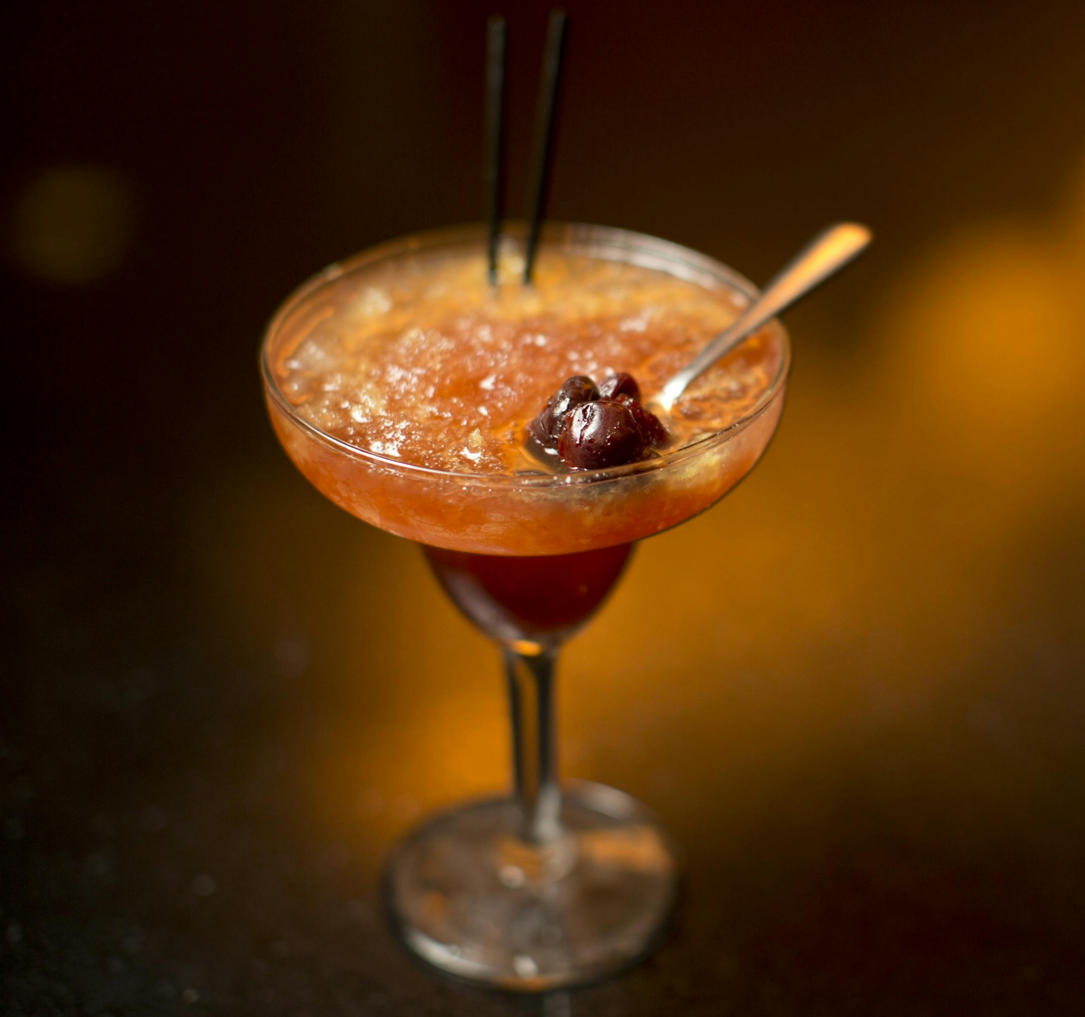 Rabbit Hole is a new bar and restaurant in the Midtown Global Market by Thomas Kim. One of Rabbit Hole's kegged cocktails: the blood, sand and ice. Those are pickled cherries in the spoon. ] JEFF WHEELER &#x201a;&#xc4;&#xa2; jeff.wheeler@startribune.com