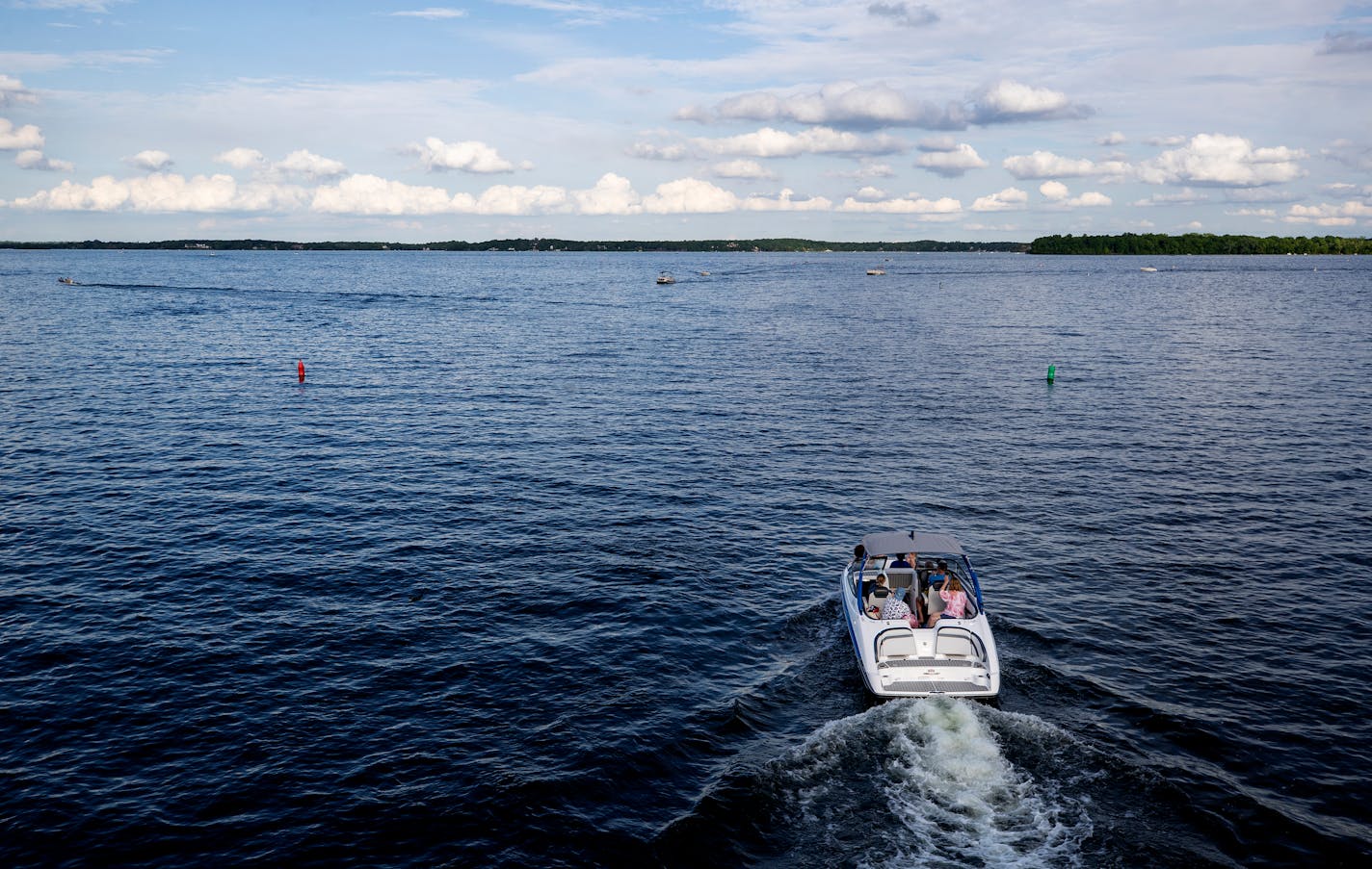 Boaters passed the Arcola Bridge on Lake Minnetonka.