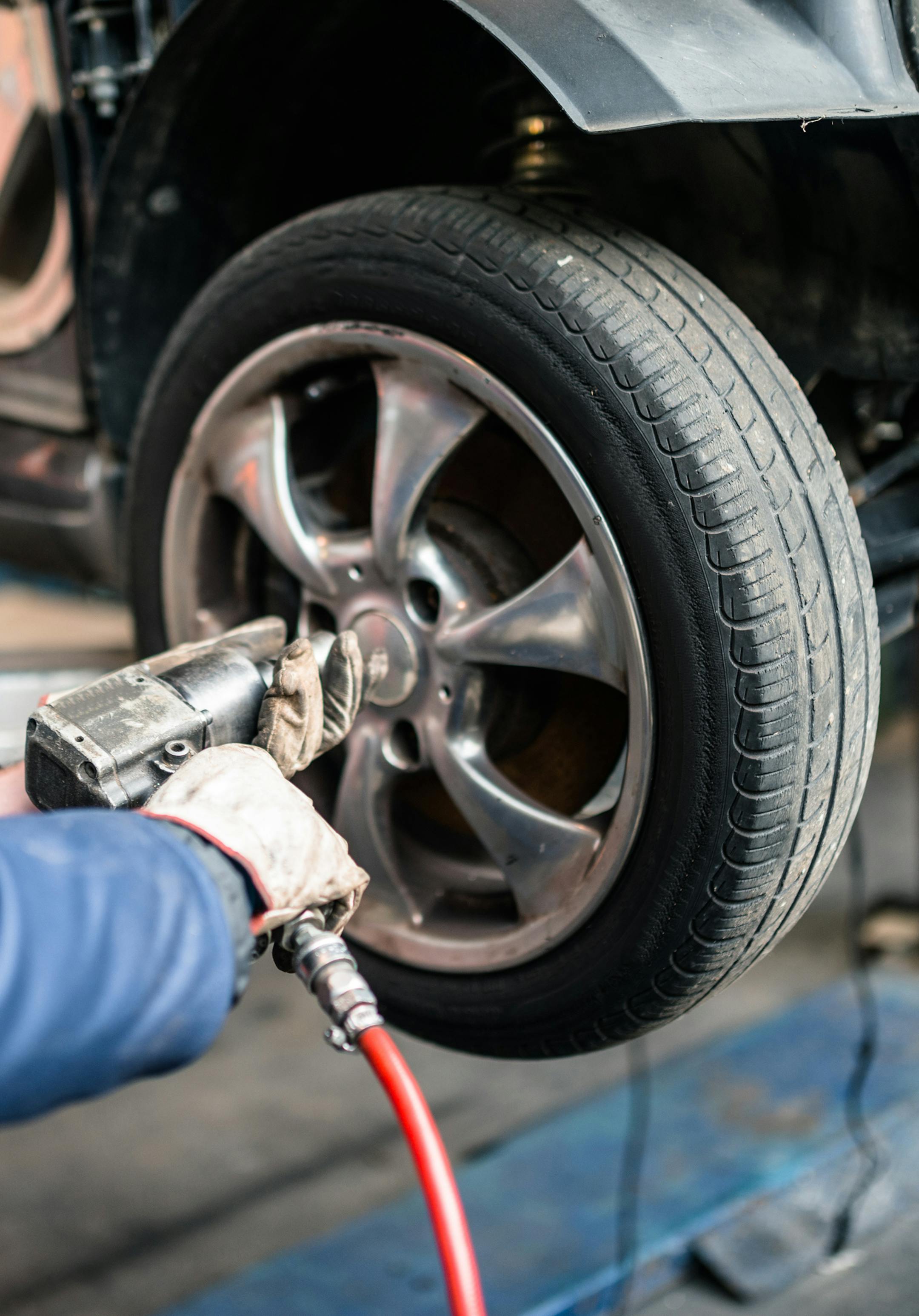 tire repairer changing the car tire