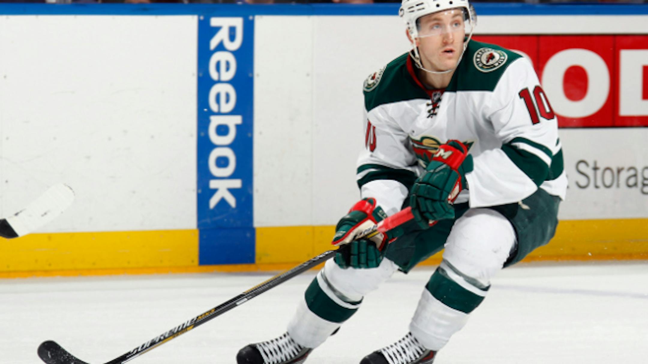 UNIONDALE, NY - MARCH 24: Jordan Schroeder #10 of the Minnesota Wild skates against the New York Islanders at the Nassau Veterans Memorial Coliseum on March 24, 2015 in Uniondale, New York. The Wild defeated teh Islanders 2-1 in the shootout.  (Photo by Bruce Bennett/Getty Images)